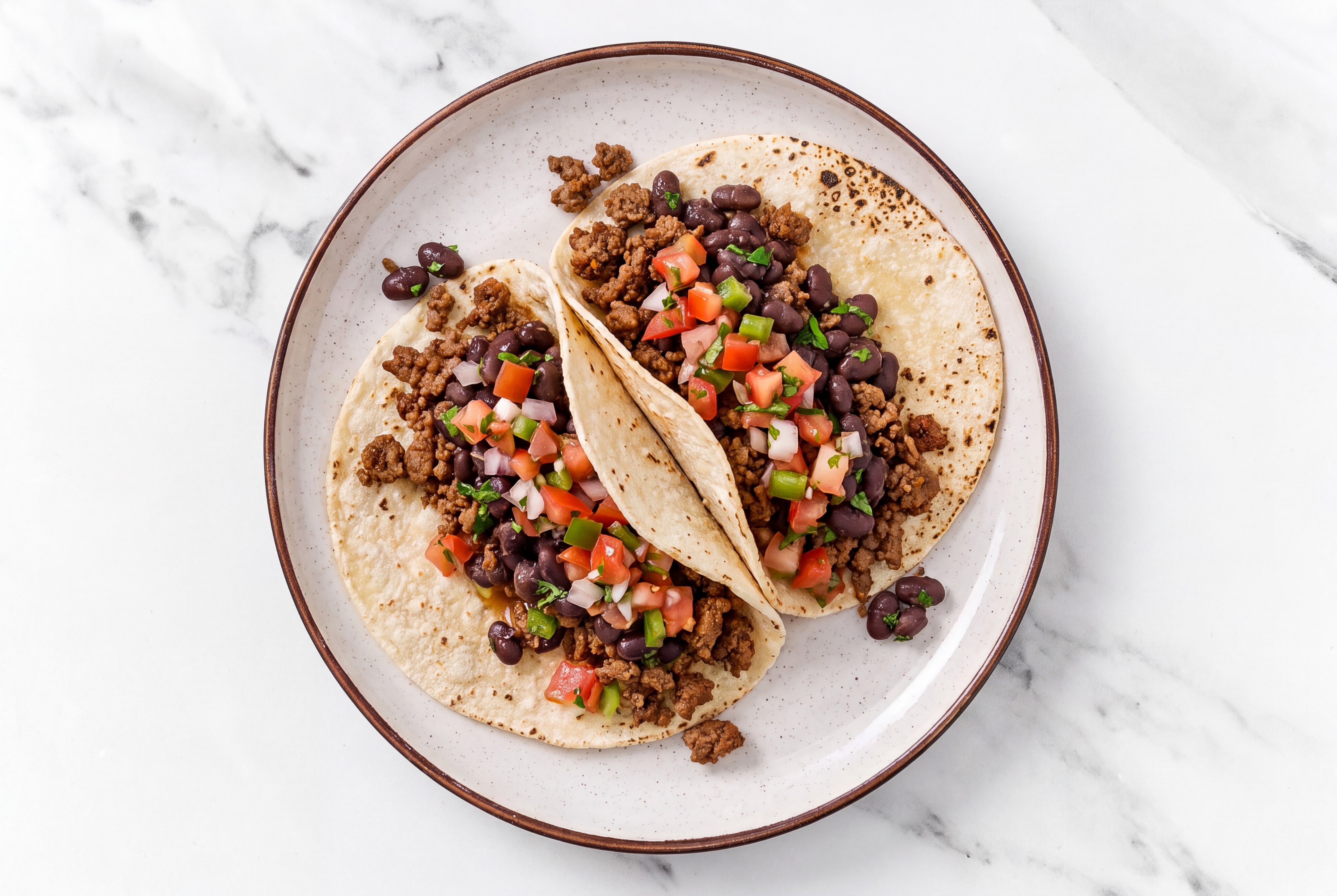 Hearty Ground 93/7 Lean Beef Tacos with Fresh Salsa & Spiced Beans