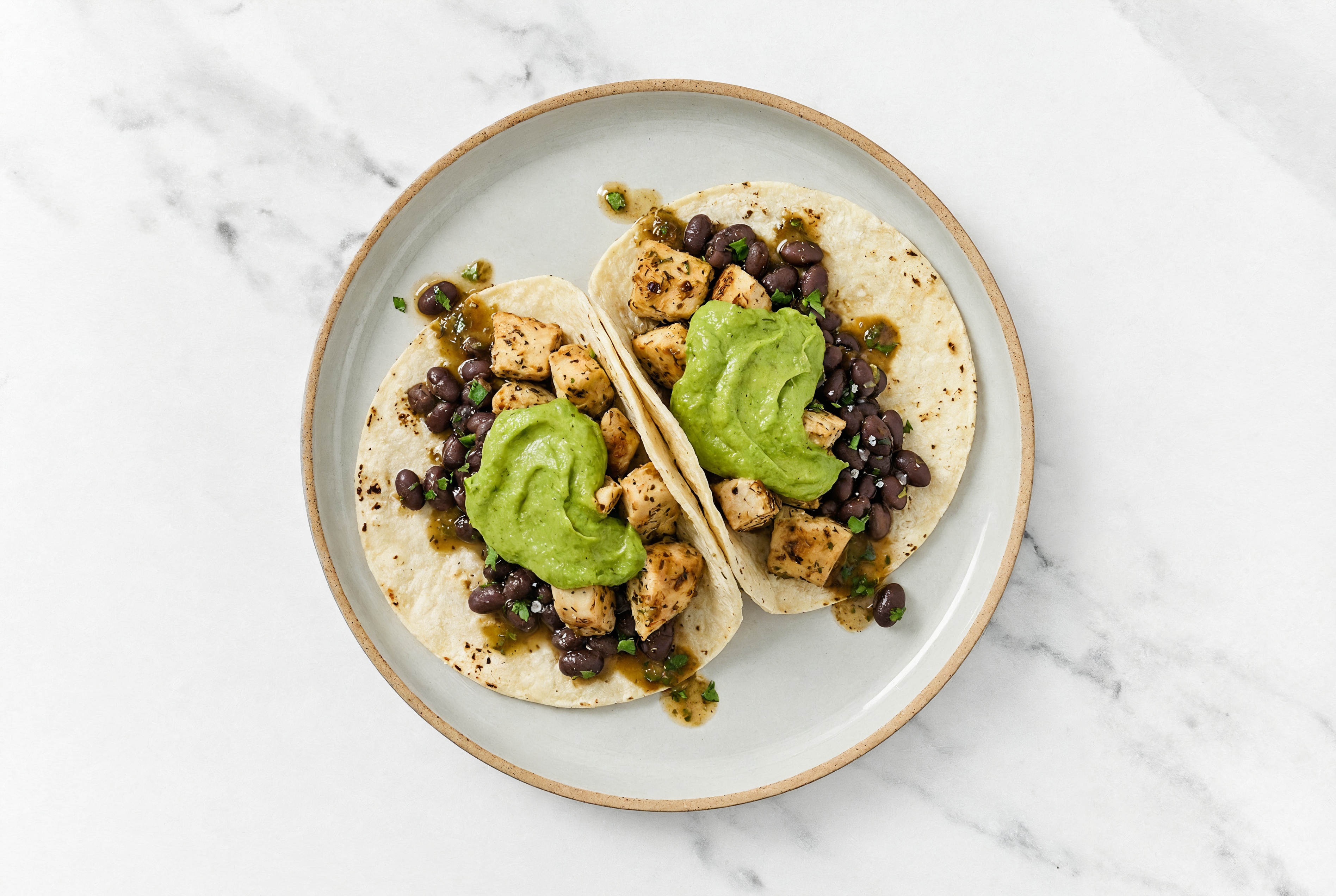 Hearty Garlic Chicken Tacos with Avocado & Spiced Beans
