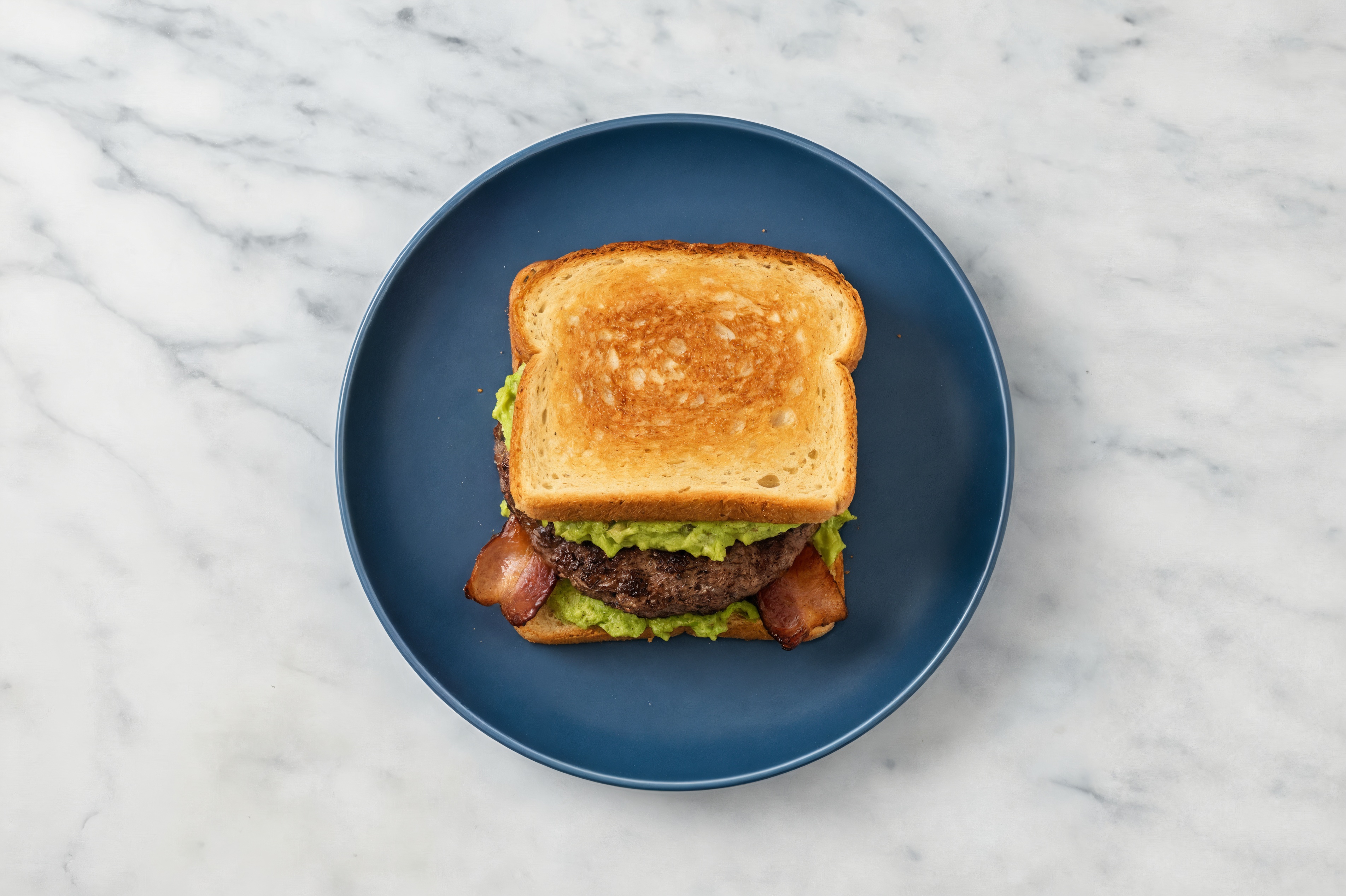 Bacon Tavern Beef Burger on GF Bread with Guacamole