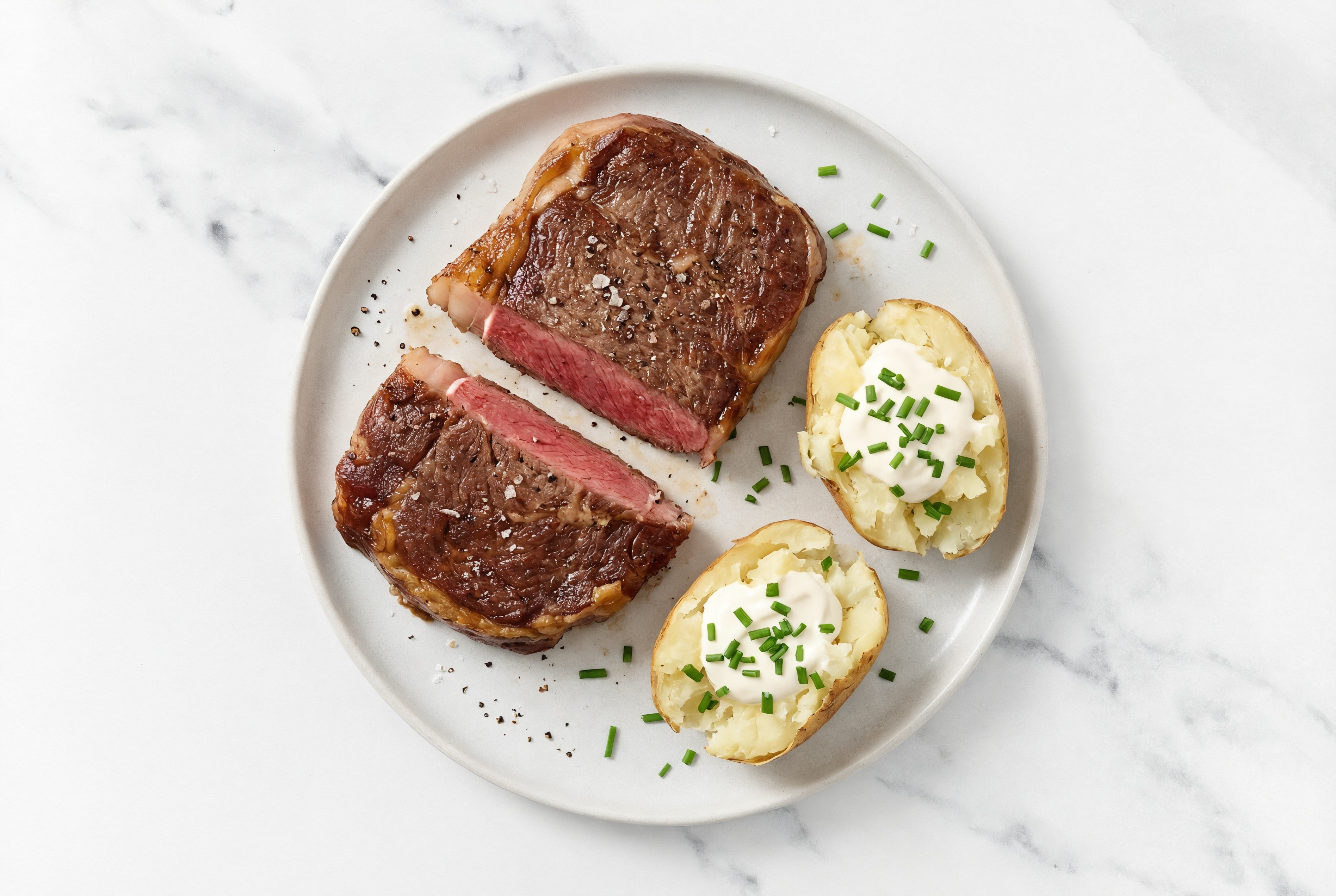Ribeye Steak + Loaded Baked Potato