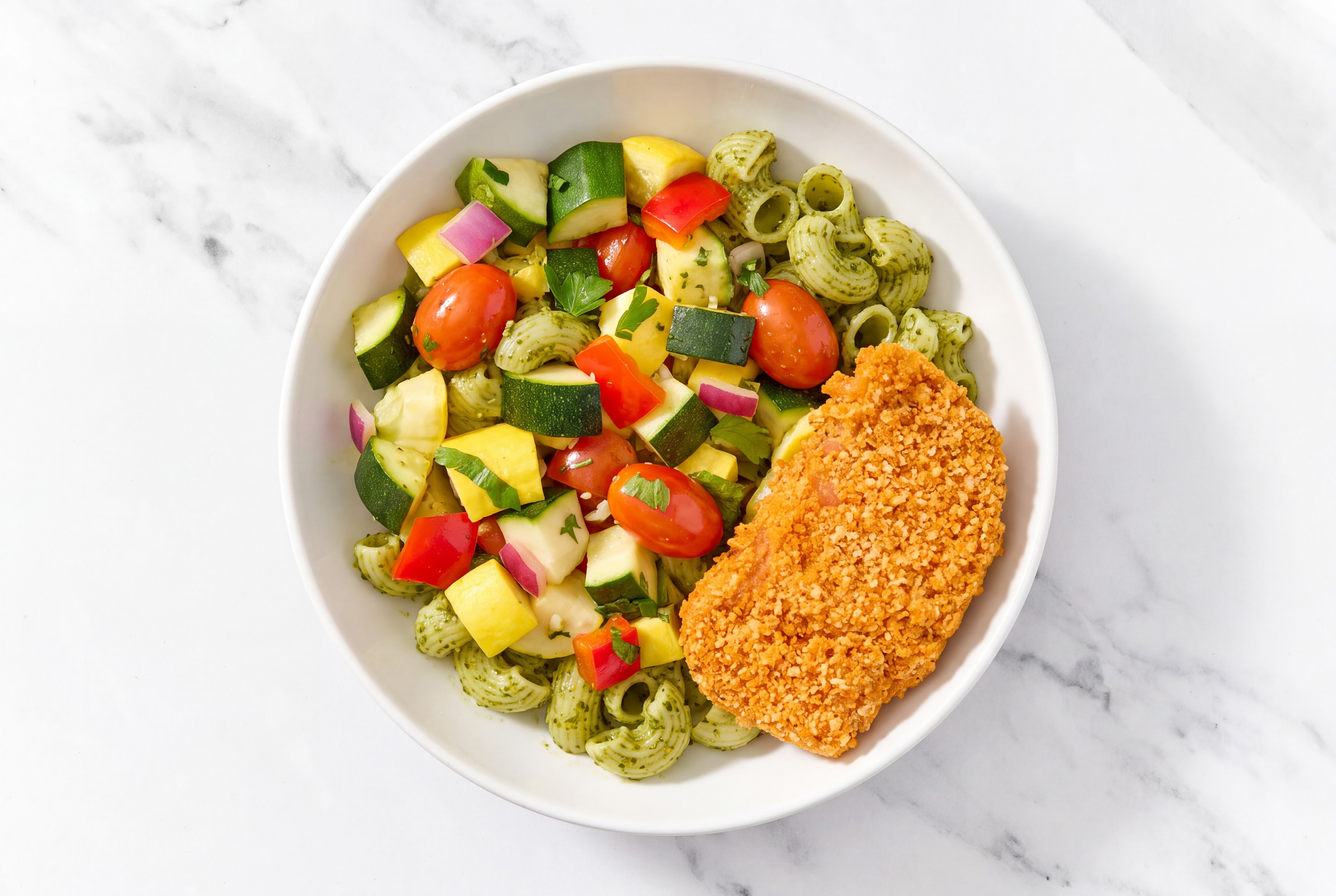 Crispy Hot Honey Chicken over Pesto Chiocciole Pasta with Mixed Veggies