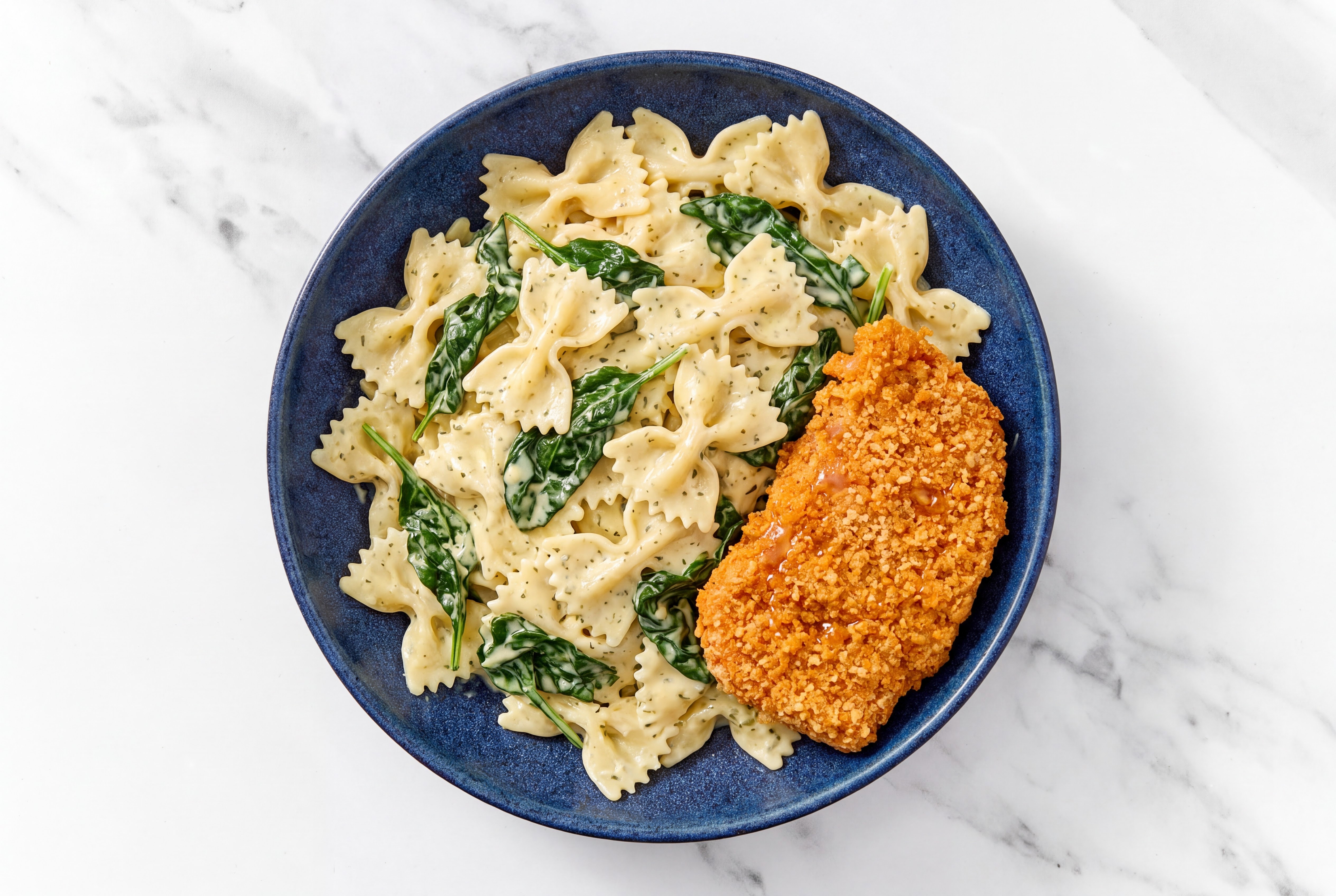 Crispy Hot Honey Chicken over Creamy Farfalle with Baby Spinach