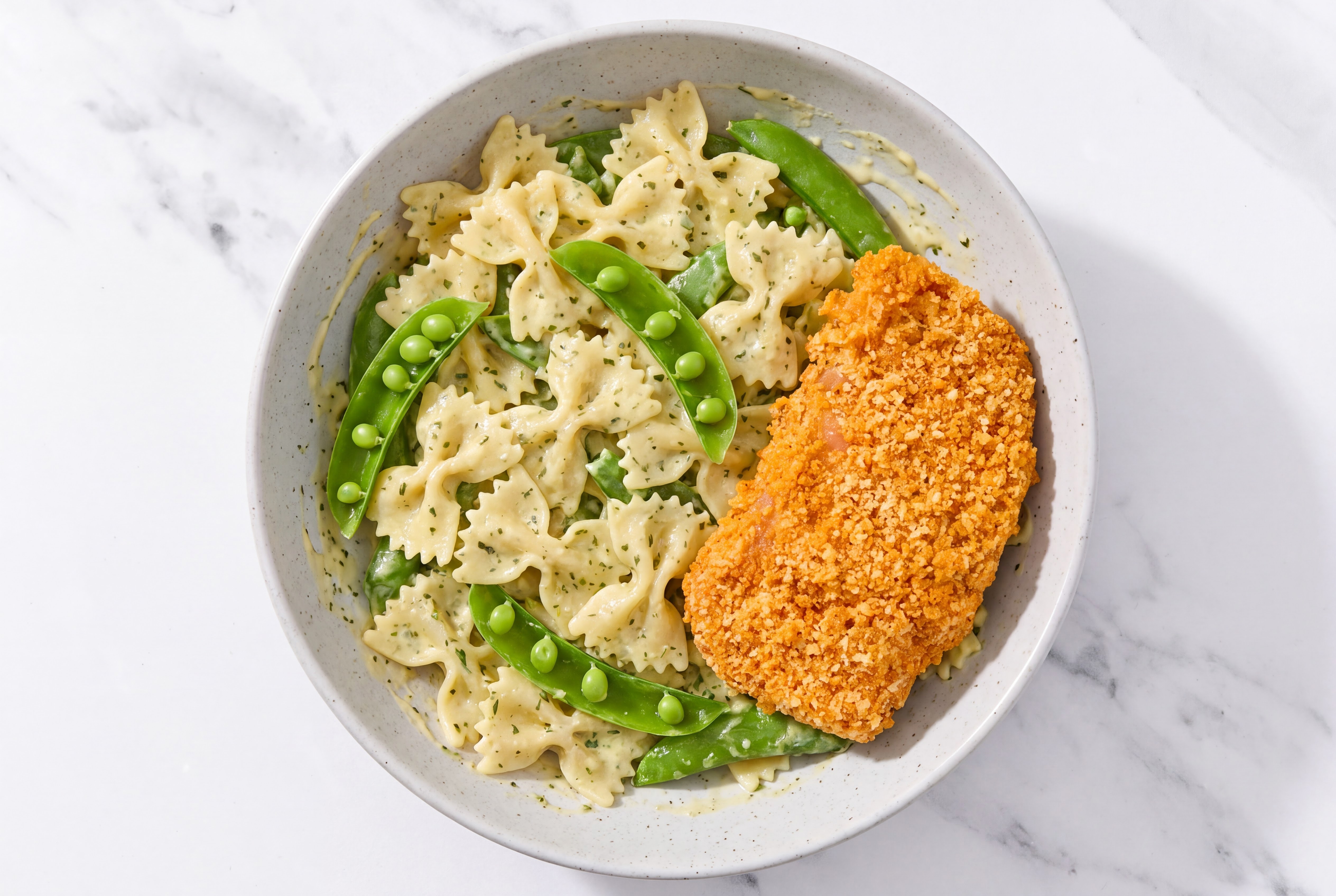 Crispy Hot Honey Chicken over Creamy Farfalle with Snap Peas