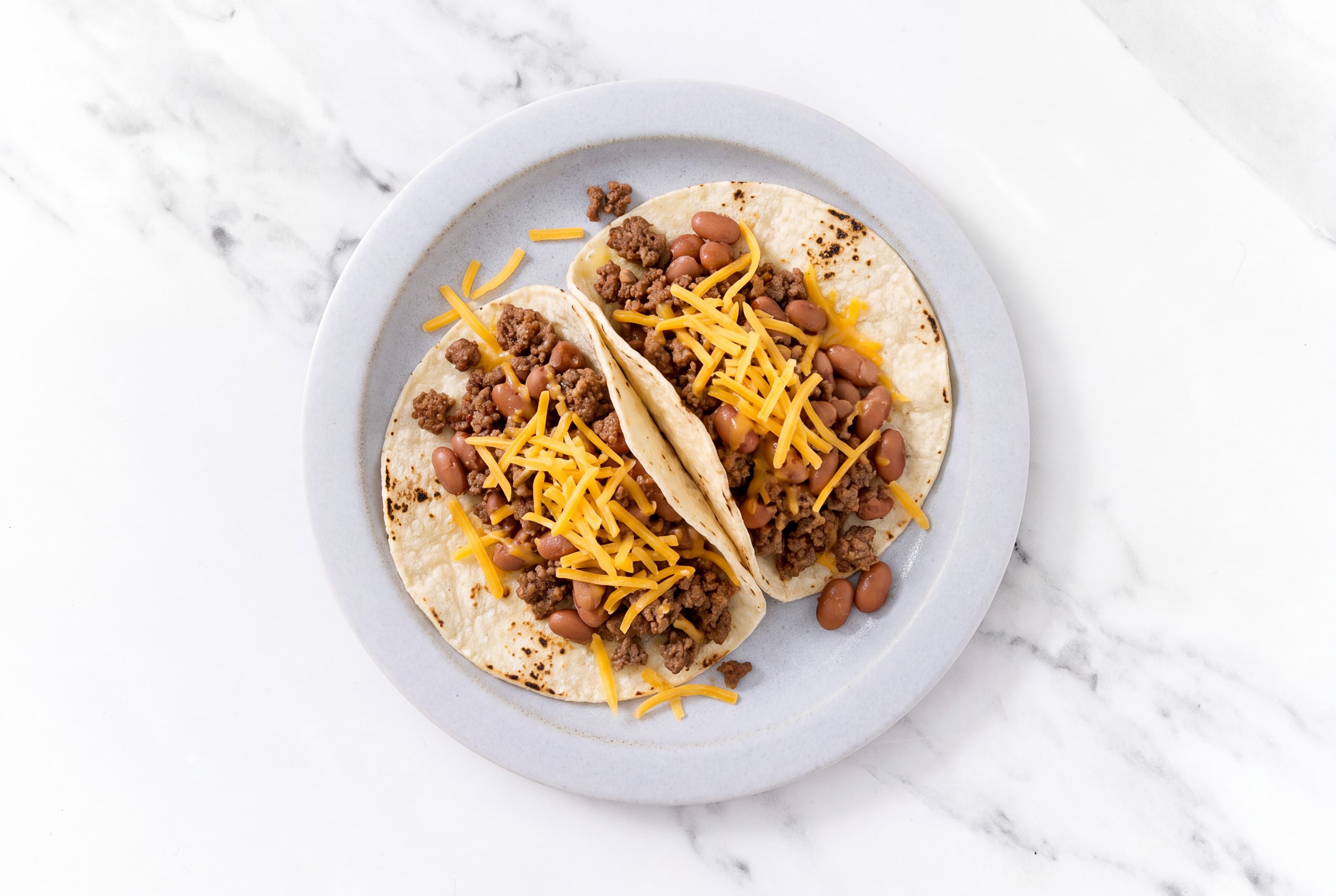 Hearty Ground 93/7 Lean Beef Tacos with Cheddar Cheese & Pinto Beans