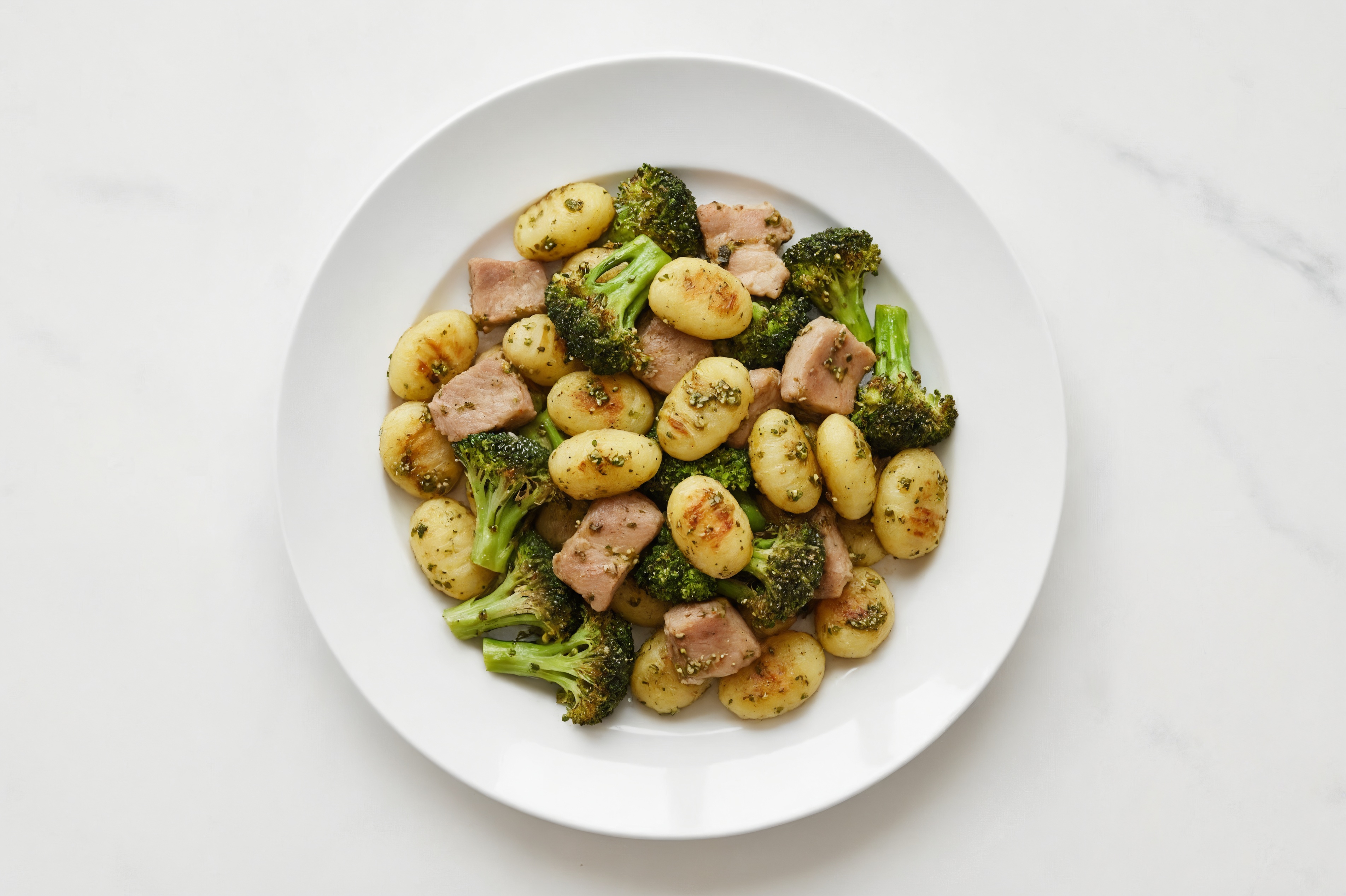 Pesto Gnocchi with Pork Chops & Broccoli