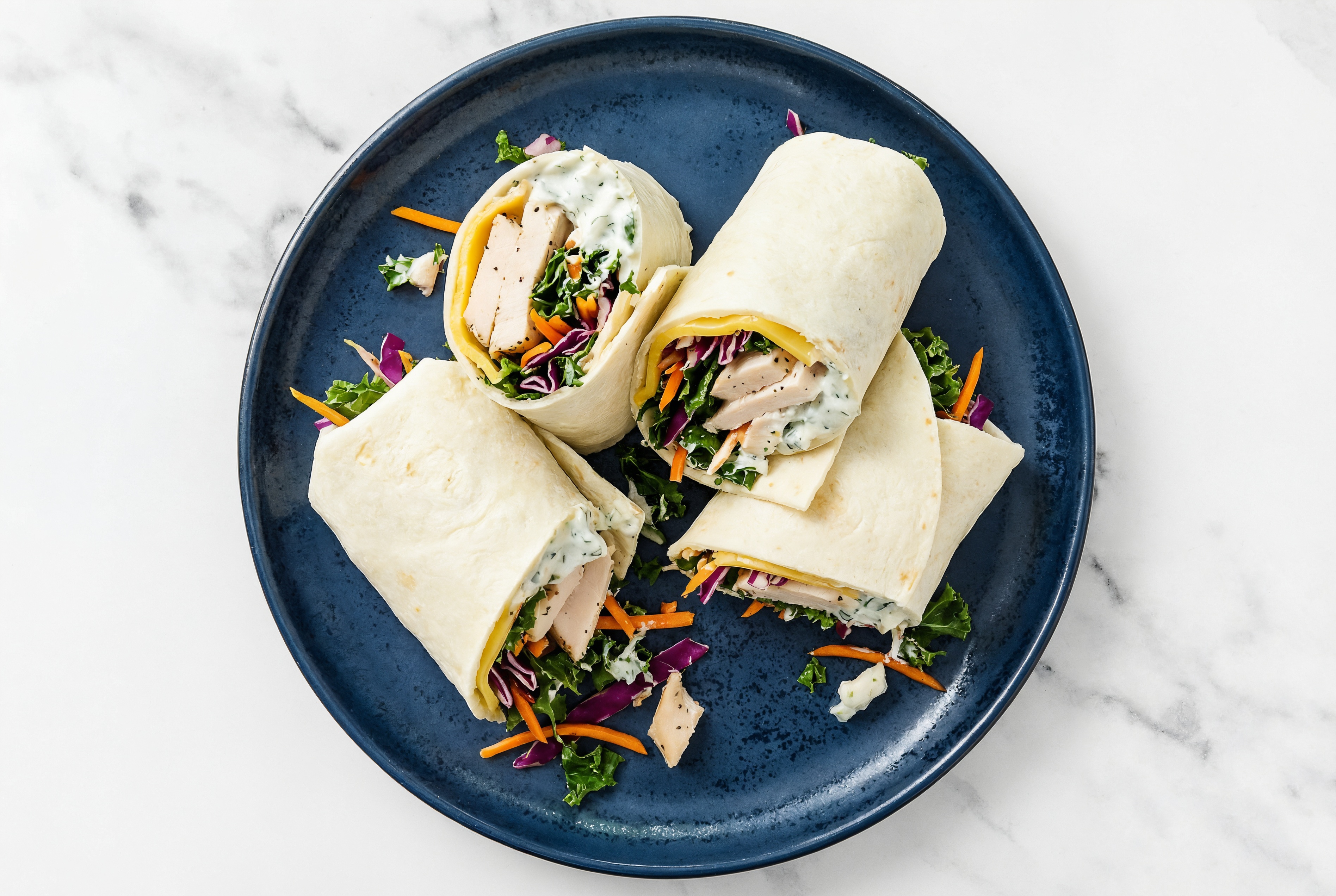 Creamy Roasted Chicken + Vegan Cheddar Wraps with Rainbow Veggies