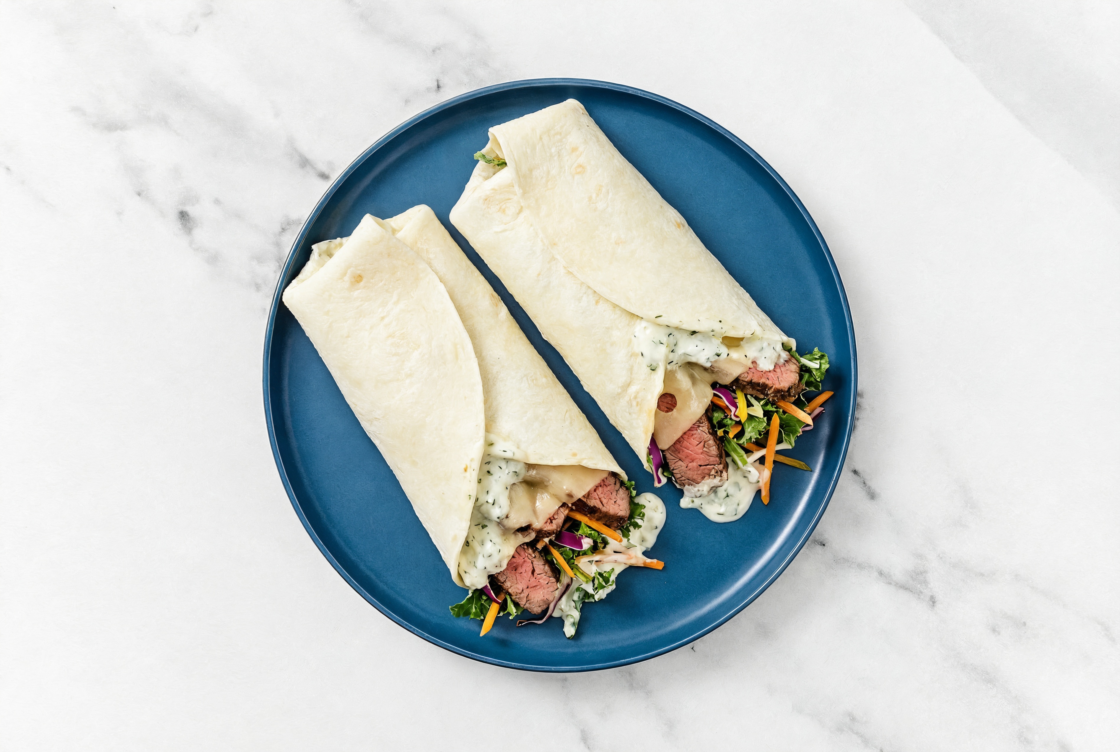 Tzatziki Sliced Steak + Swiss Wraps with Rainbow Veggies