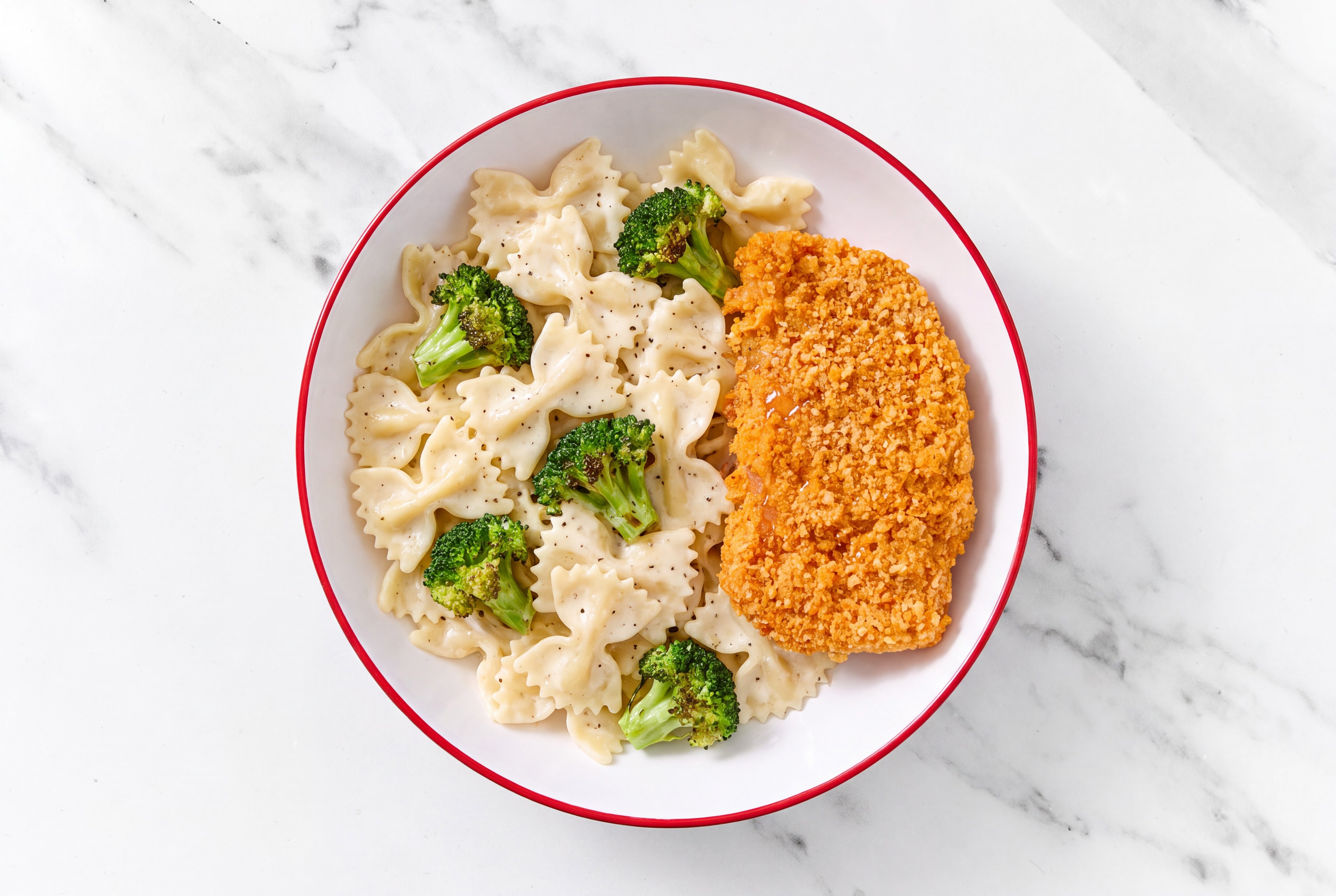 Crispy Hot Honey Chicken over Alfredo Farfalle with Broccoli