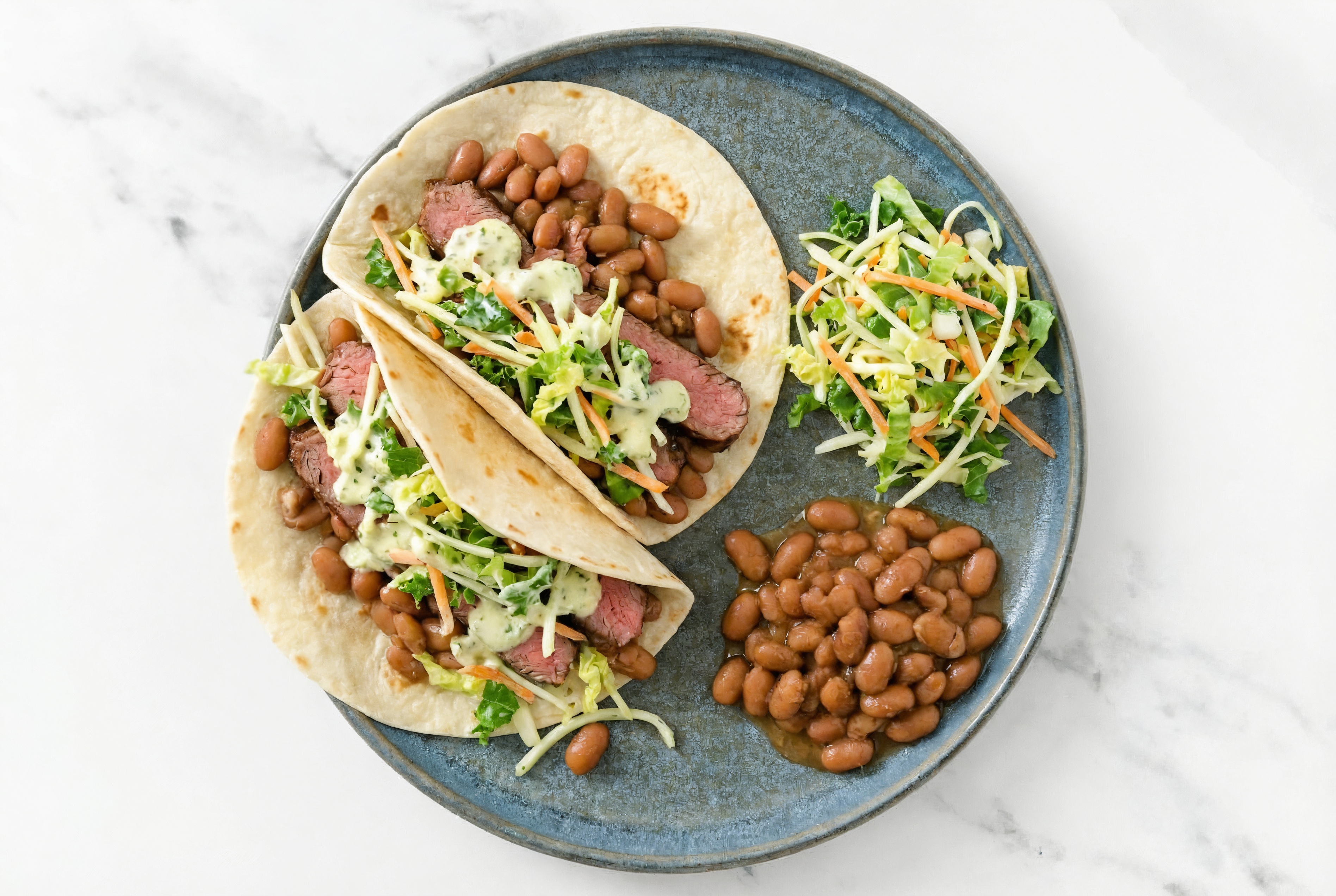 Cowboy Steak n' Bean Tacos with Jalapeño Super Slaw