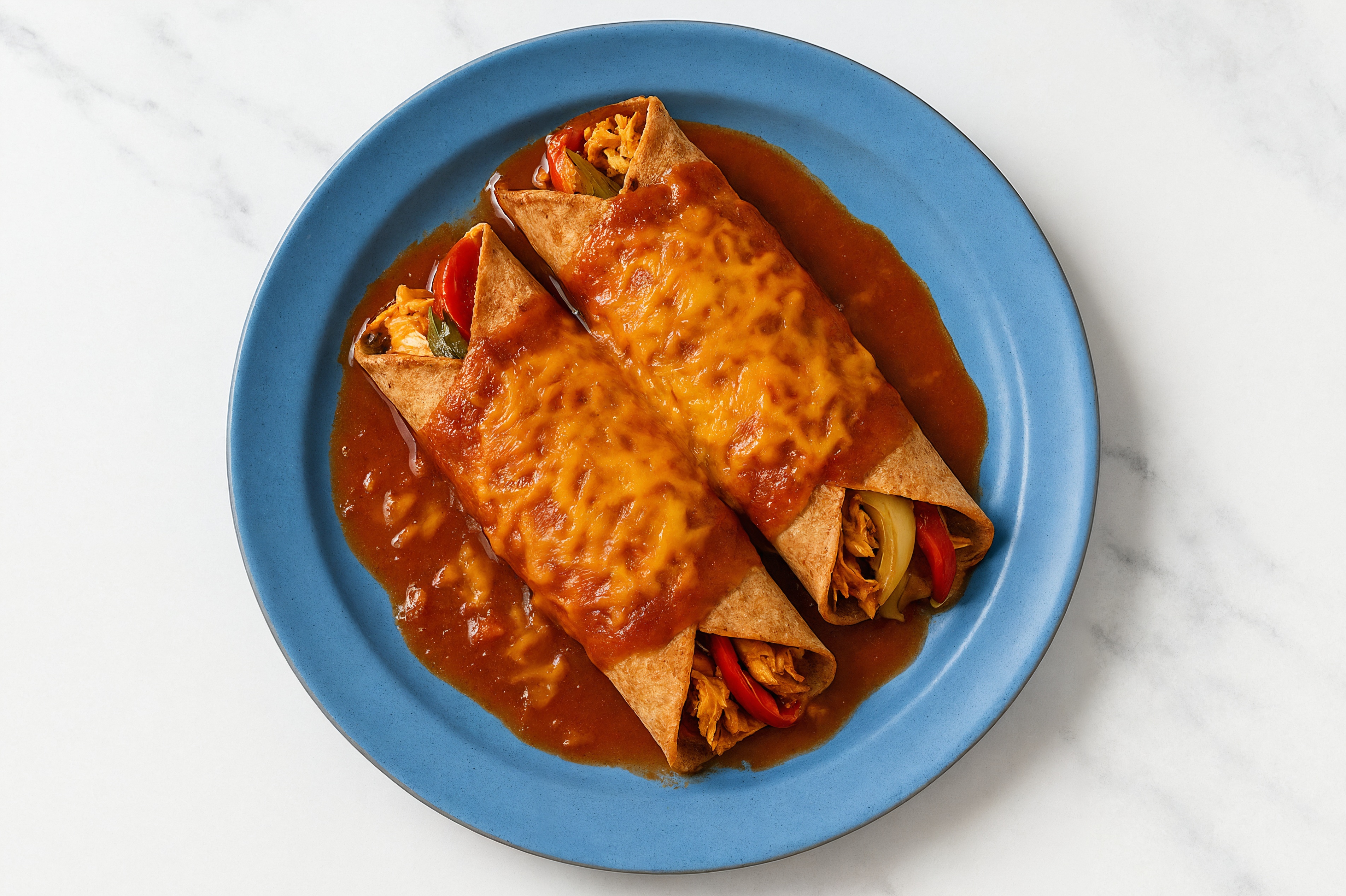 Herby Keto-Friendly Chicken Enchiladas Rojas with Shredded Sharp