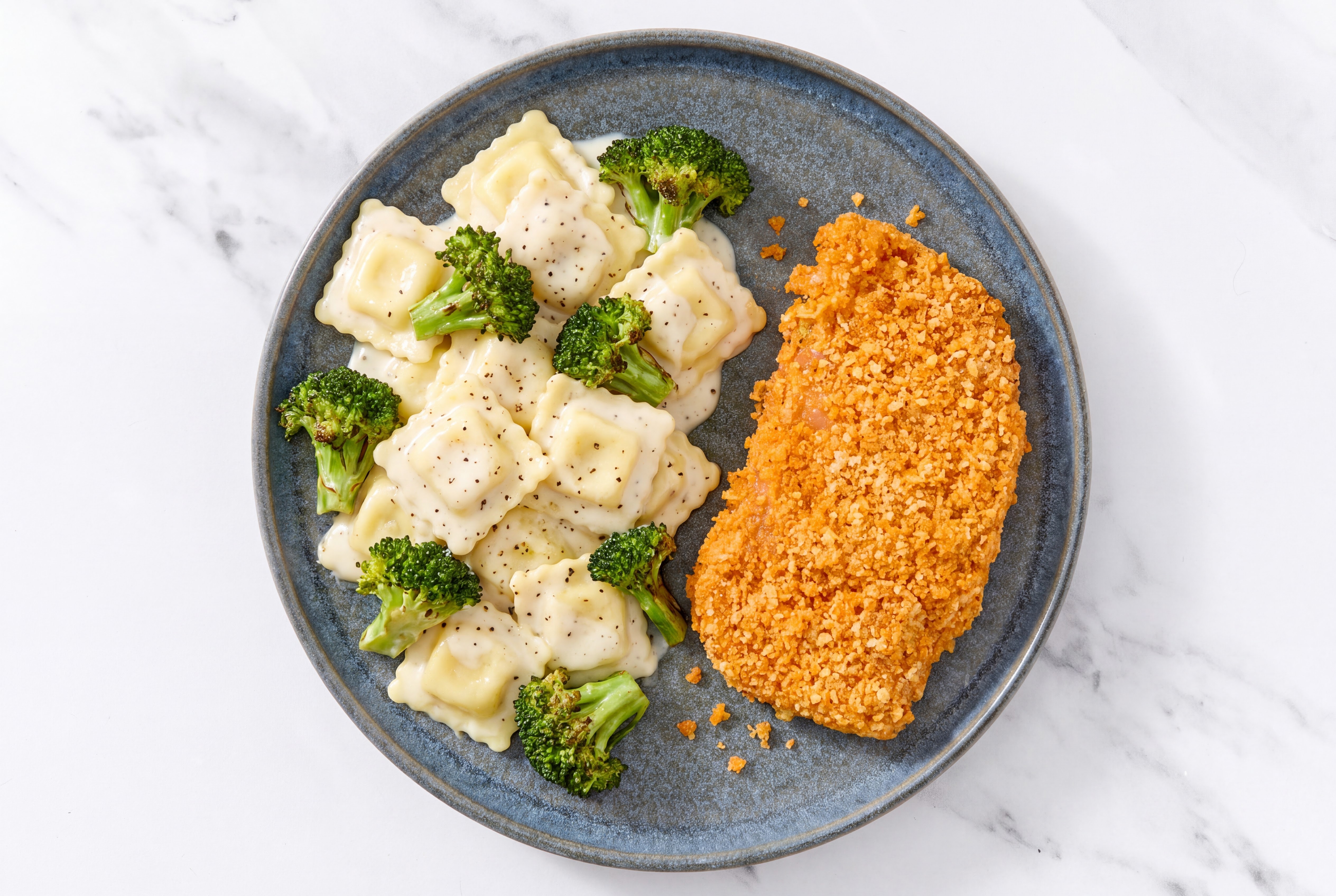 Crispy Hot Honey Chicken over Alfredo Ravioli with Broccoli