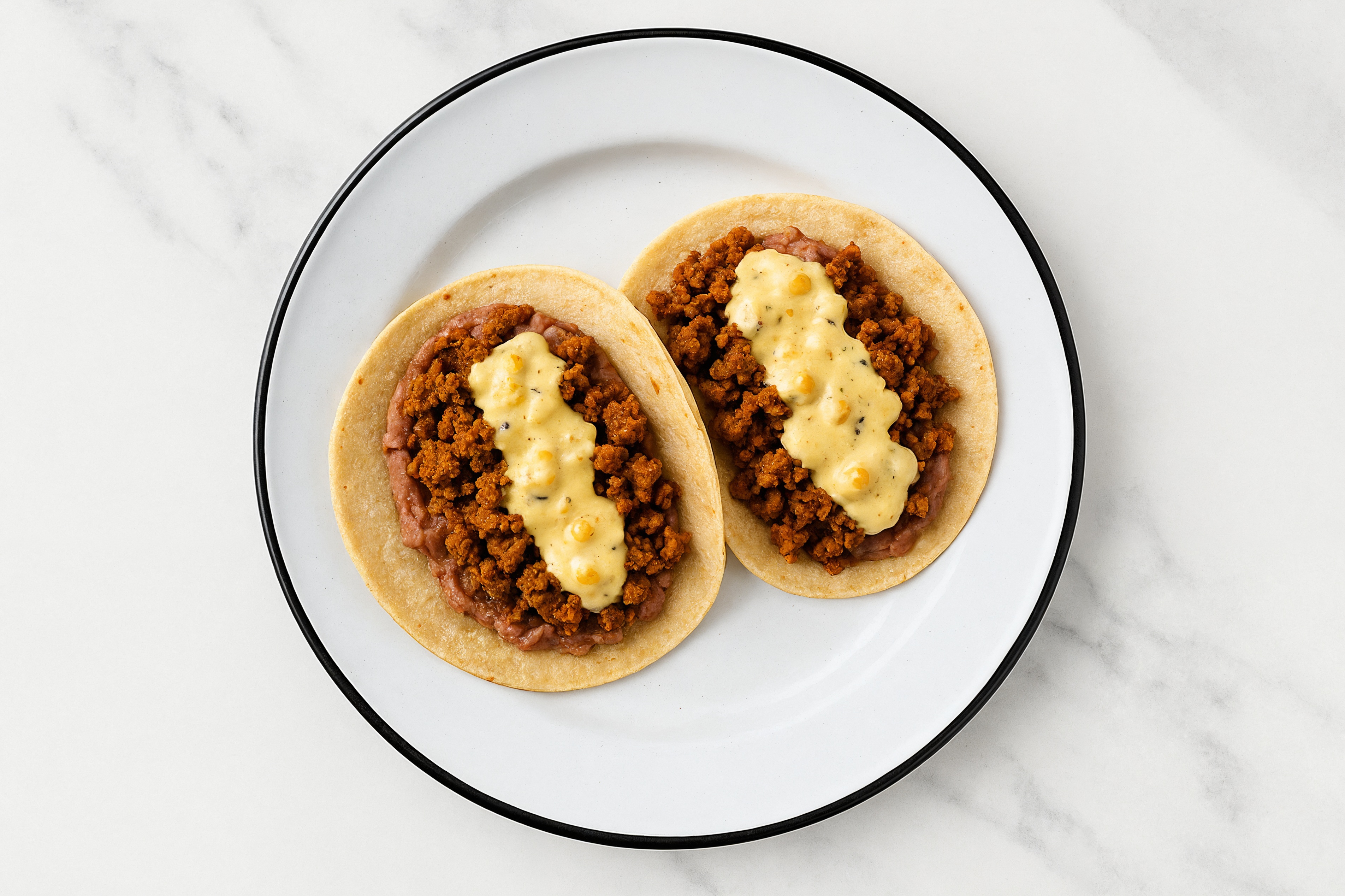 Refried Red Bean Tacos with "Chorizo" & Street Corn Sauce