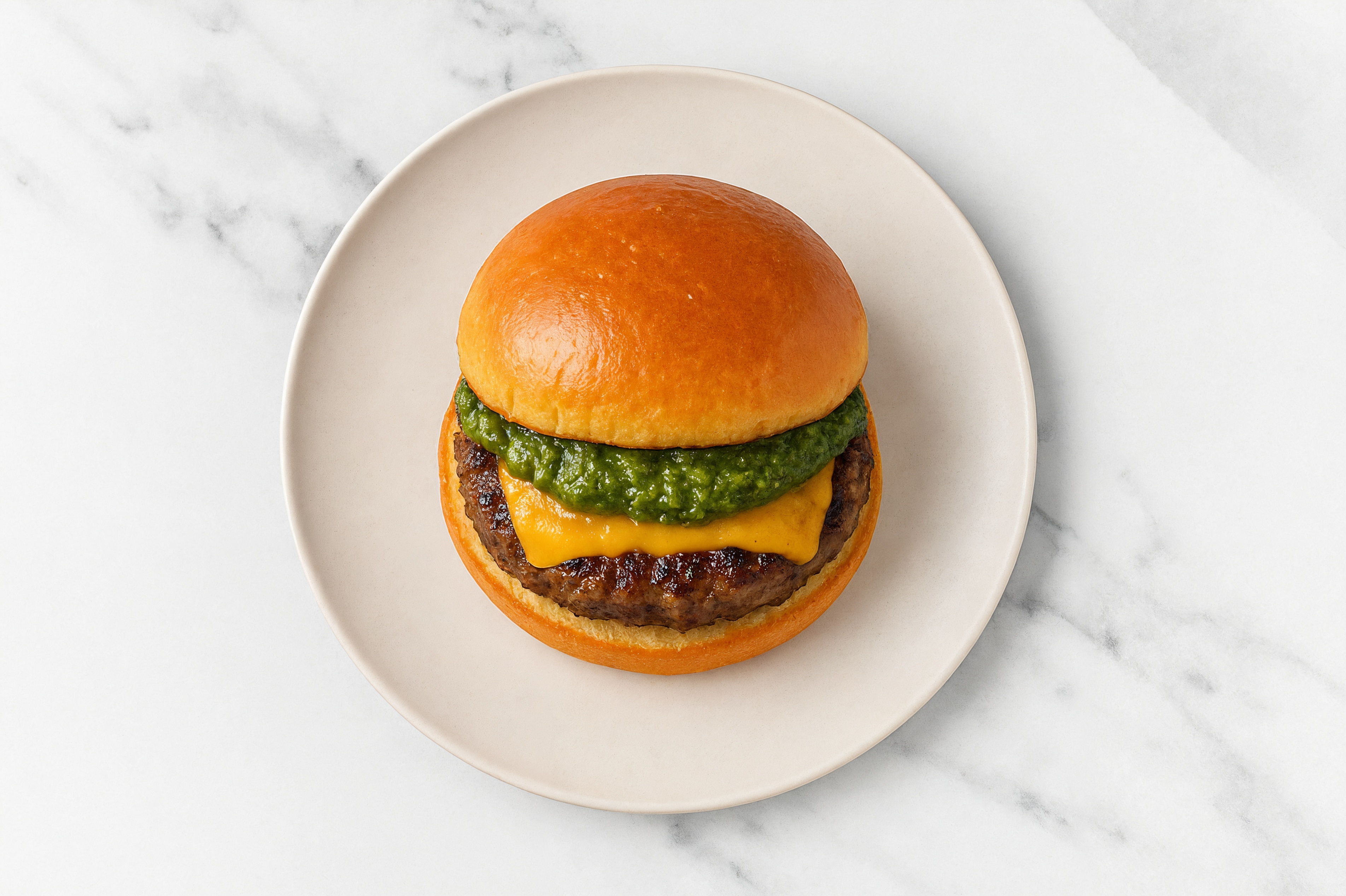 Ground Lamb Burger Buns on Brioche with Spinach Pesto & Cheddar
