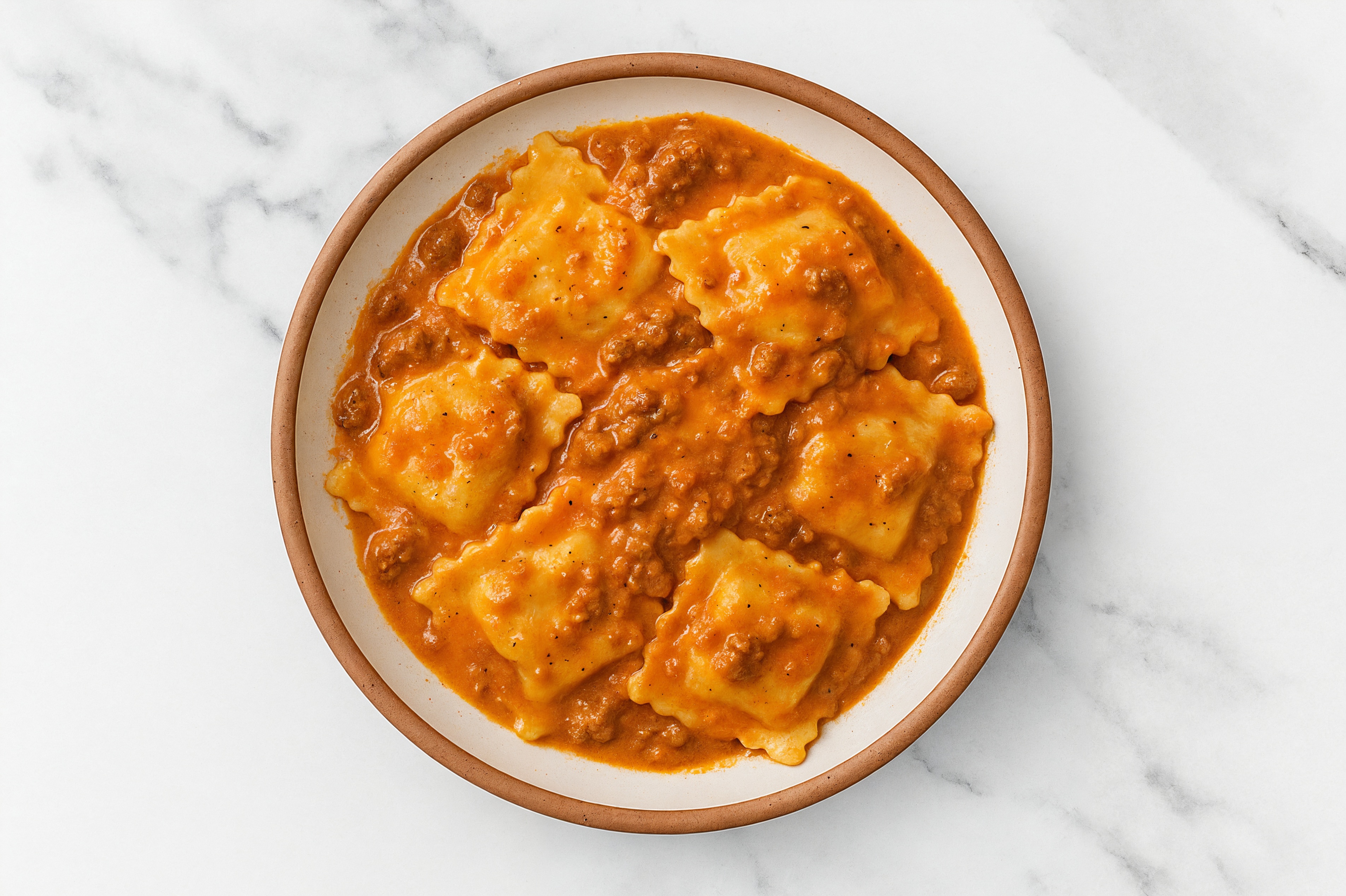 Beef Ravioli with Creamy Bison Meat Sauce