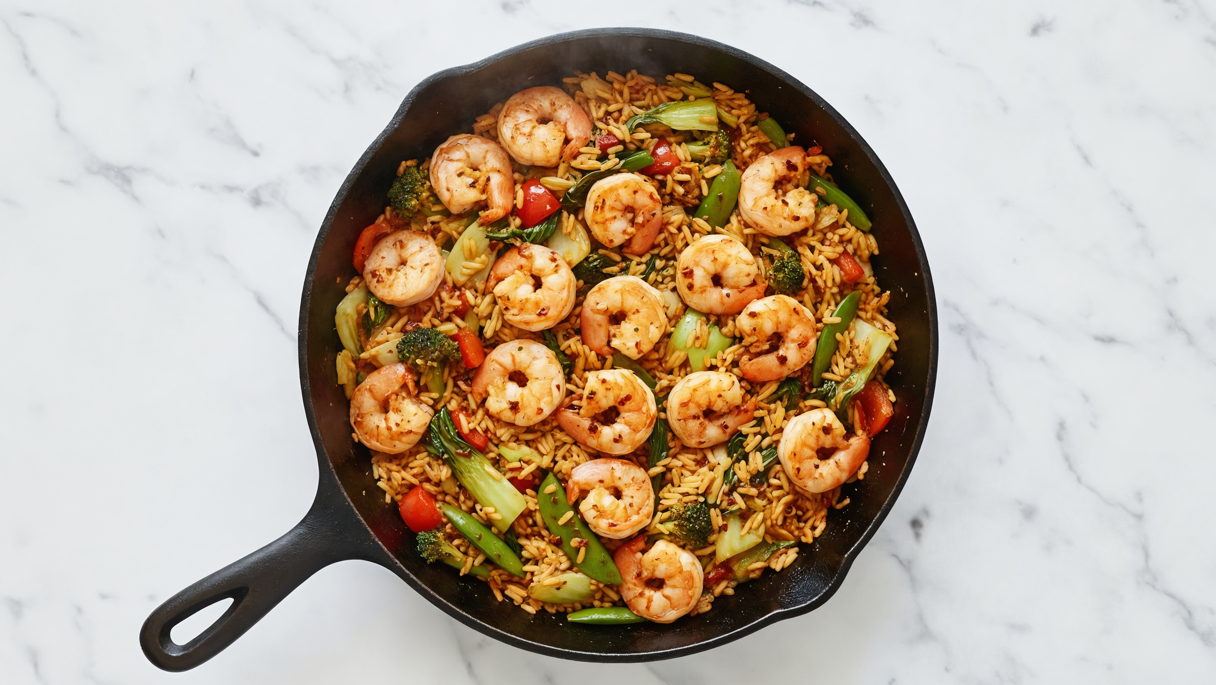 Chili Crisp Jumbo Shrimp with Bok Choy Mix + Bell Pepper over Chicken & Herb Rice