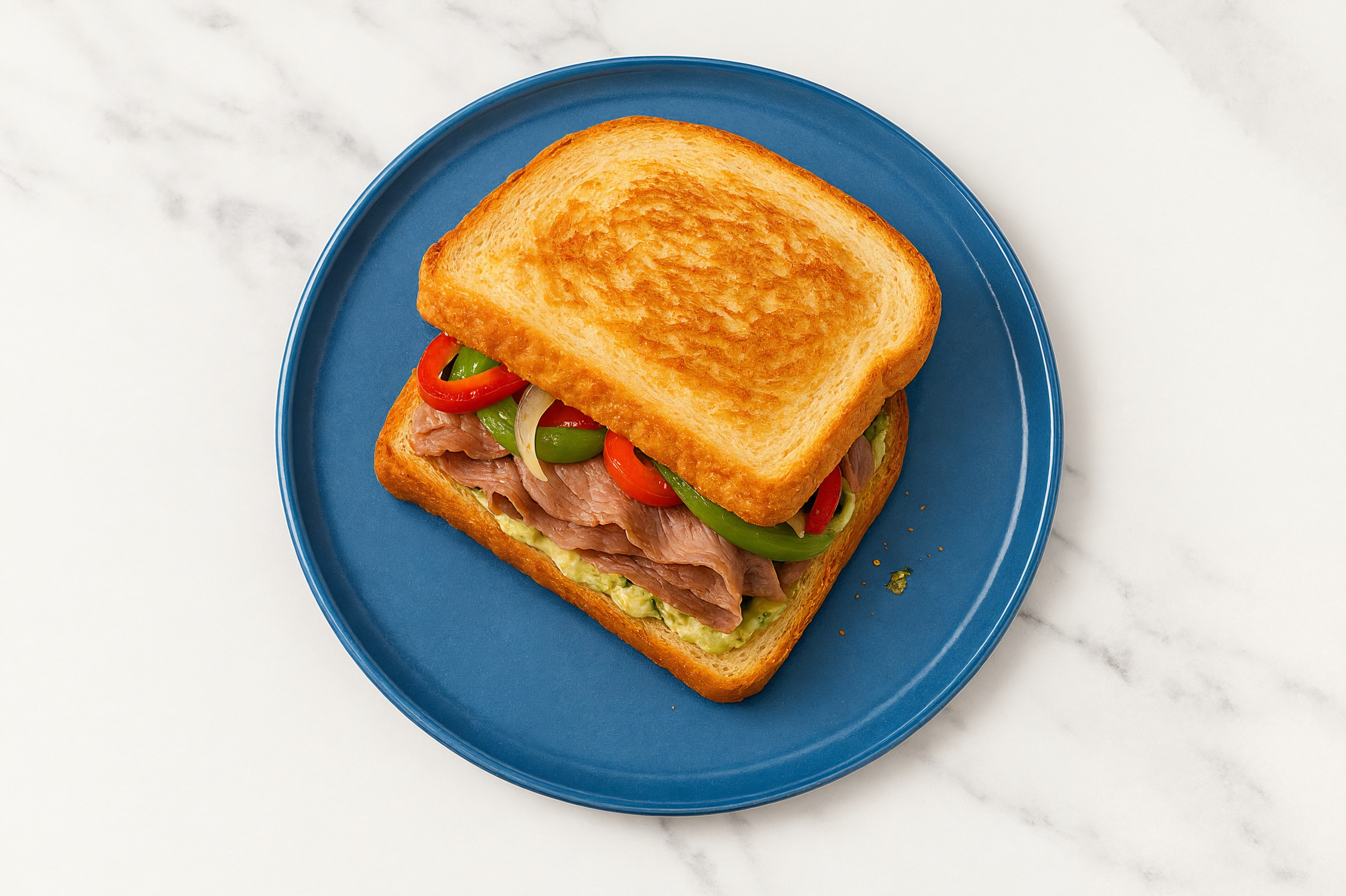 Creamy Artichoke Beef Steak Sandwich with Peppers + Onion on Honey White Bread