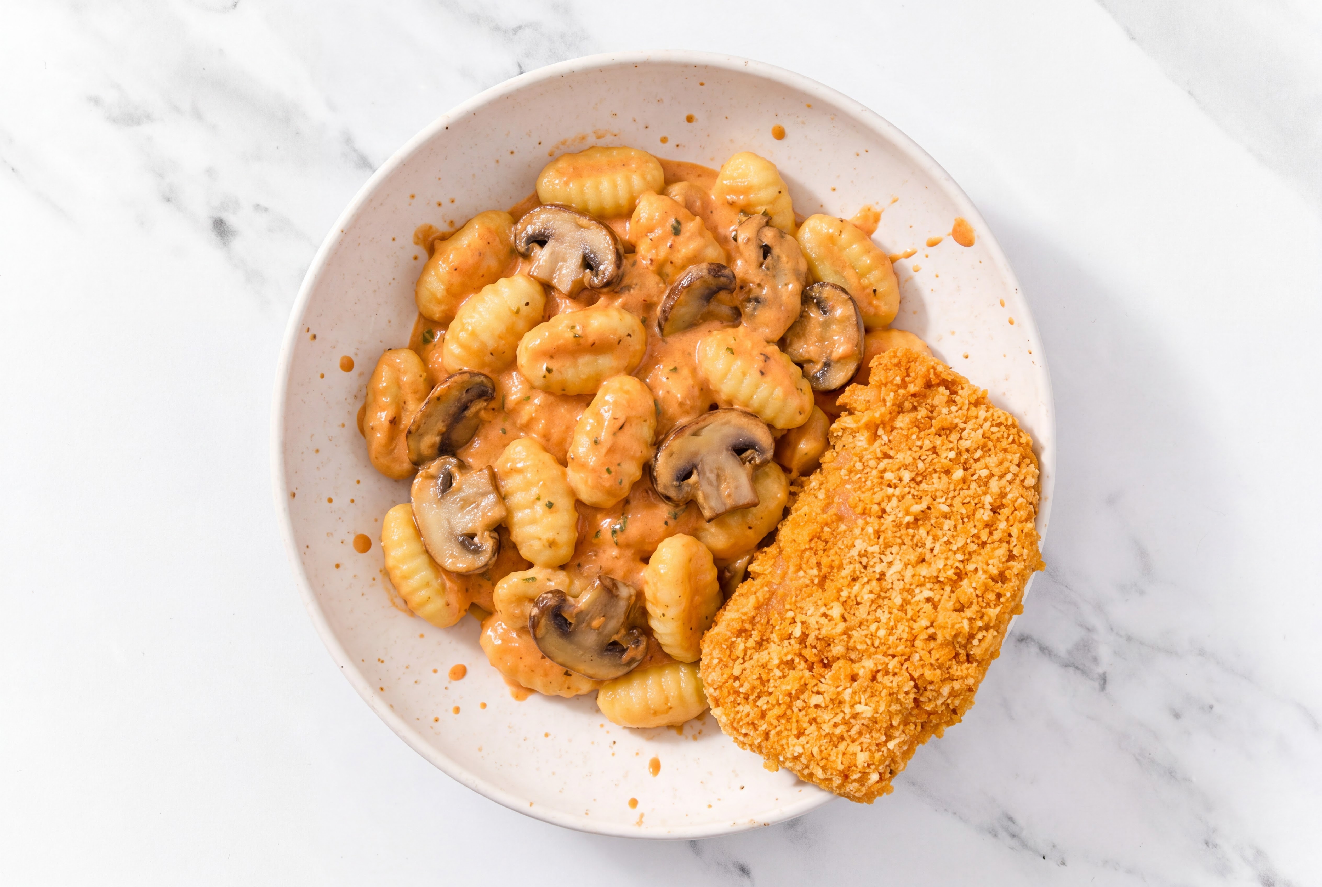 Crispy Hot Honey Chicken over Creamy Vodka Gnocchi with Baby Bella Mushrooms
