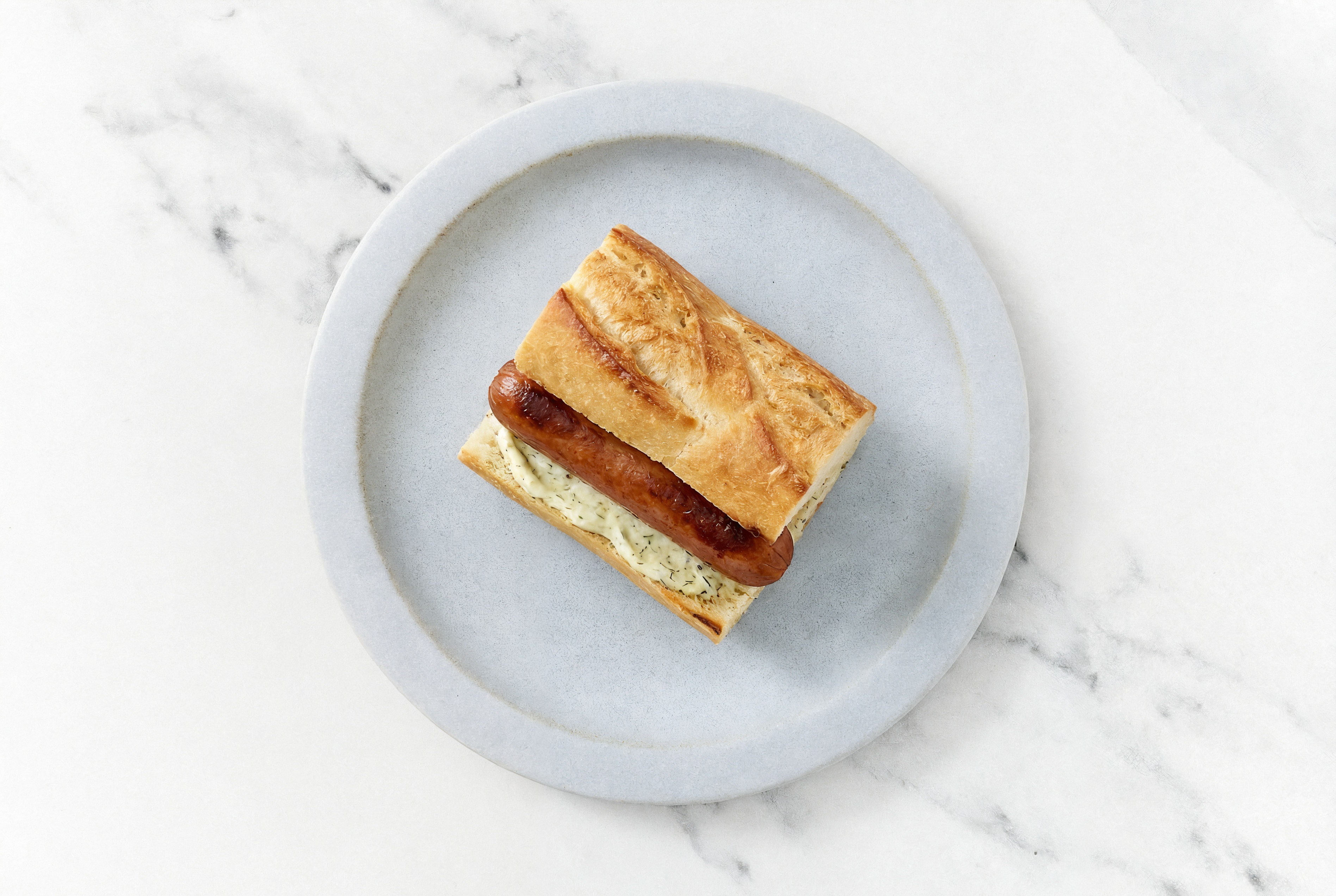 Beef Hot Dog with Garlic Sauce on Baguette