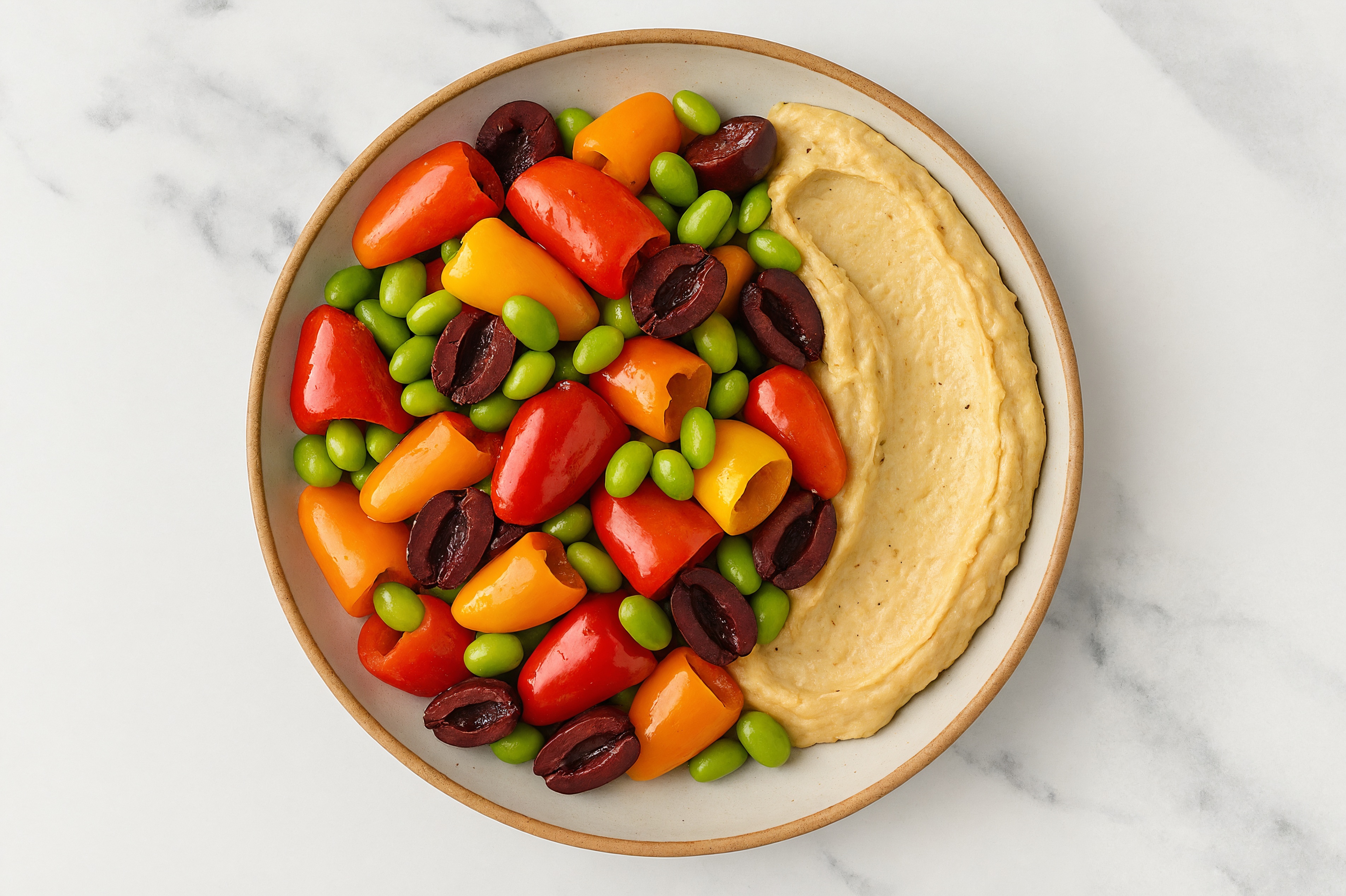 Olive Sweet Pepper Edamame Bowl over Onion Hummus