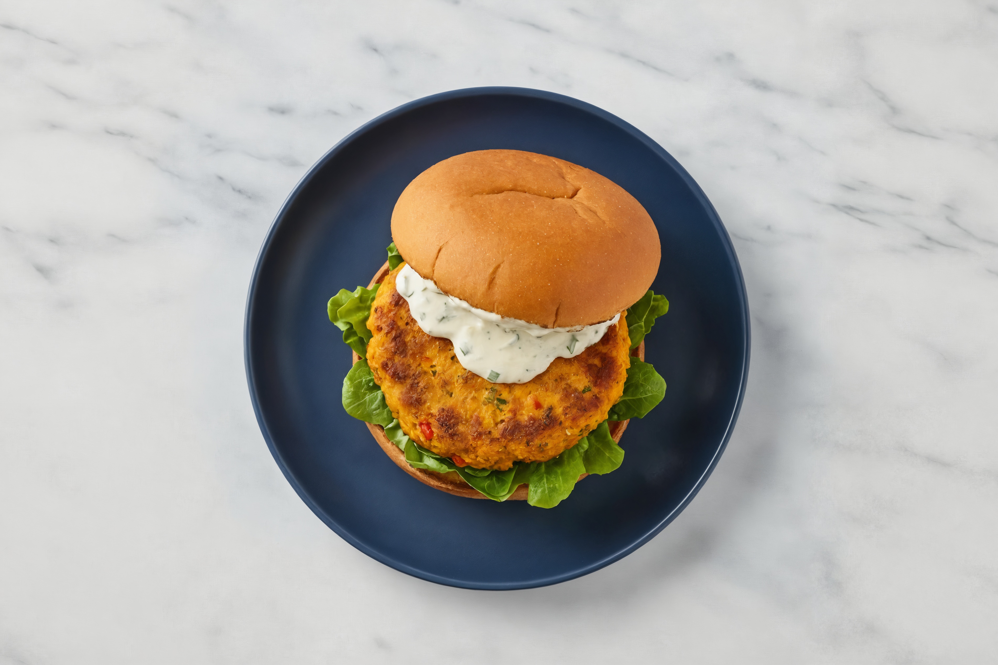 Sweet Potato Veggie Burger with Garlic Sauce on GF Buns