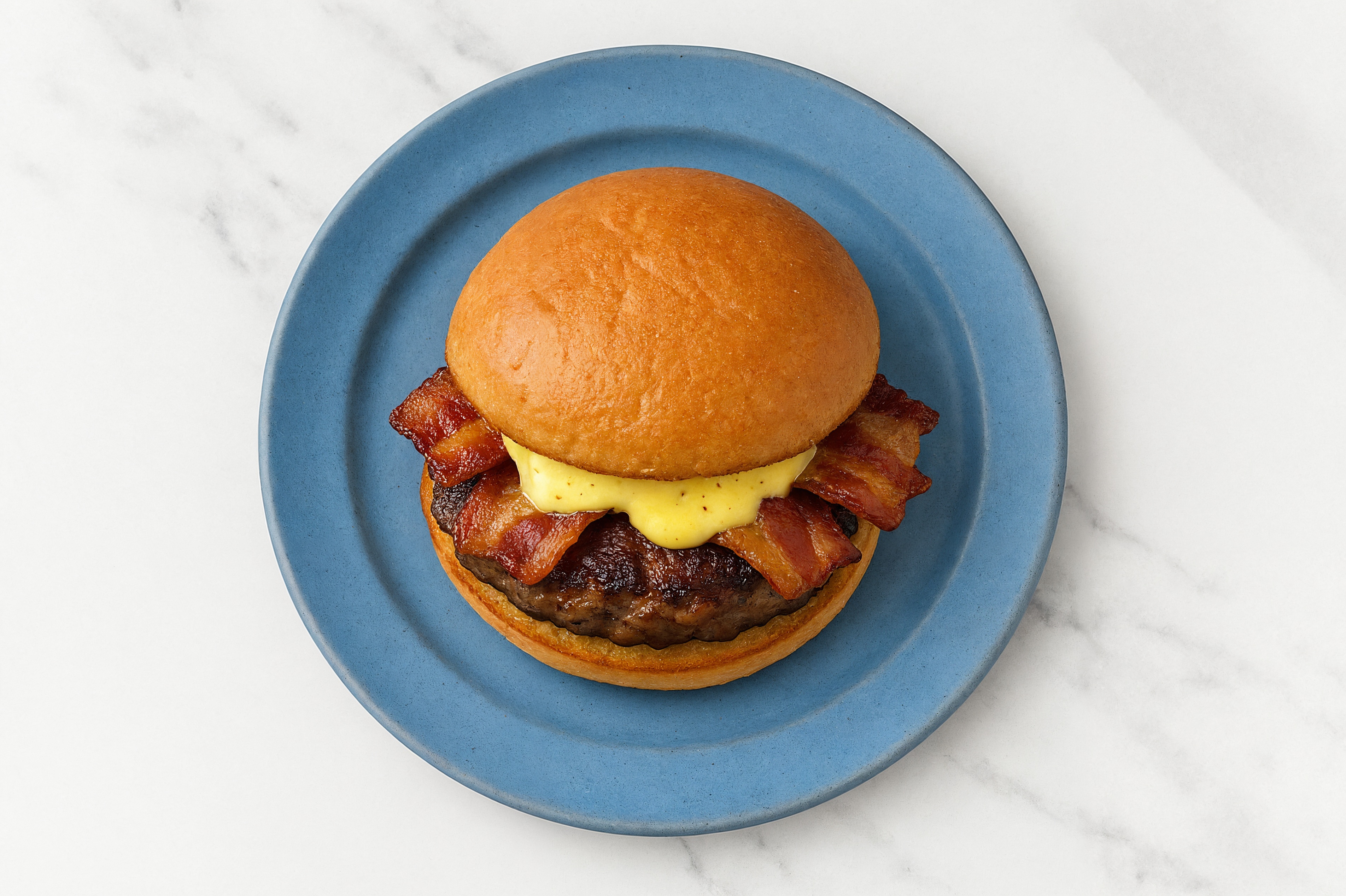 Applewood Smoked Pork Bacon Tavern Beef Burger on GF Bun with Honey Mustard