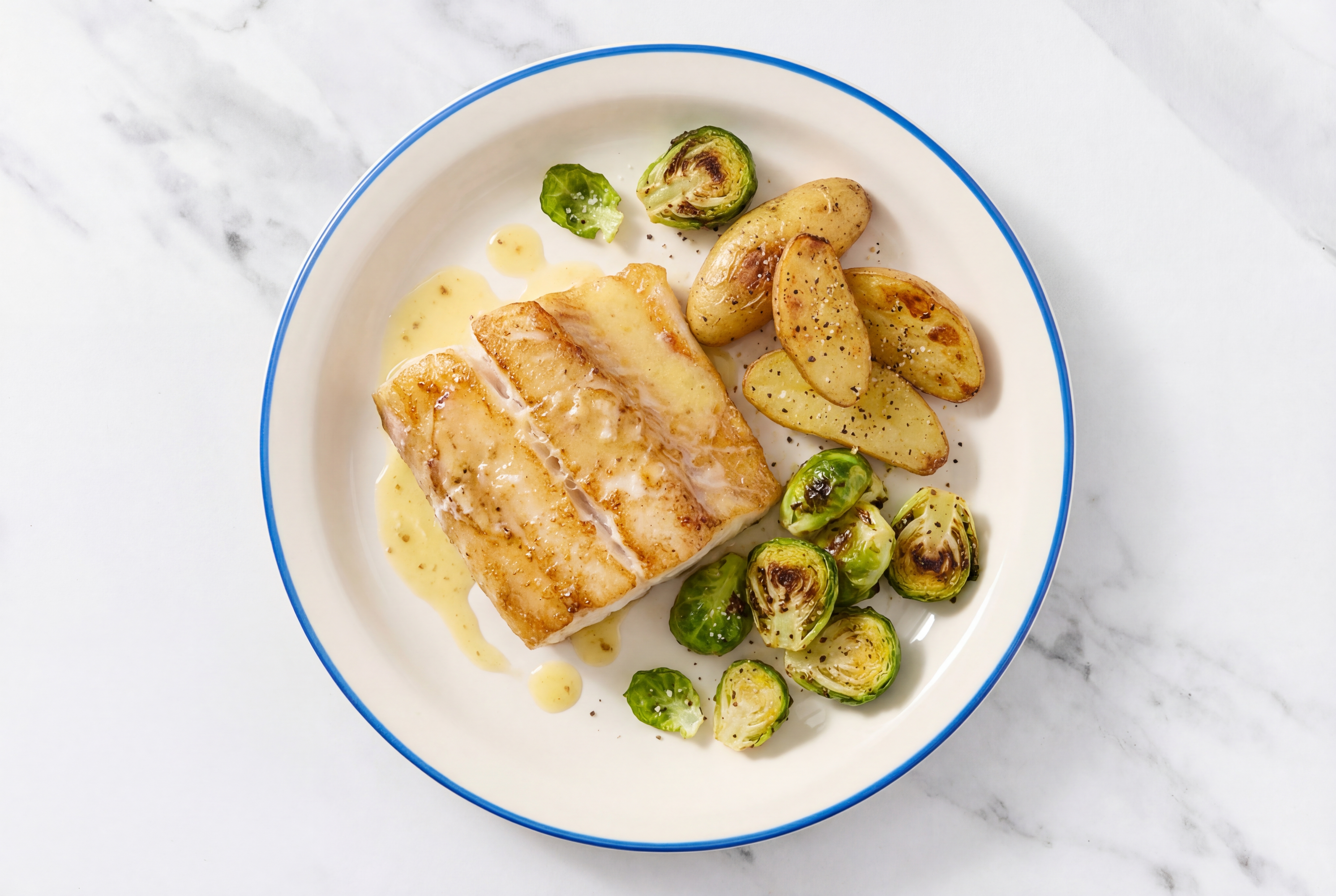 Lemon-Butter Barramundi with Fingerling Potatoes & Brussels