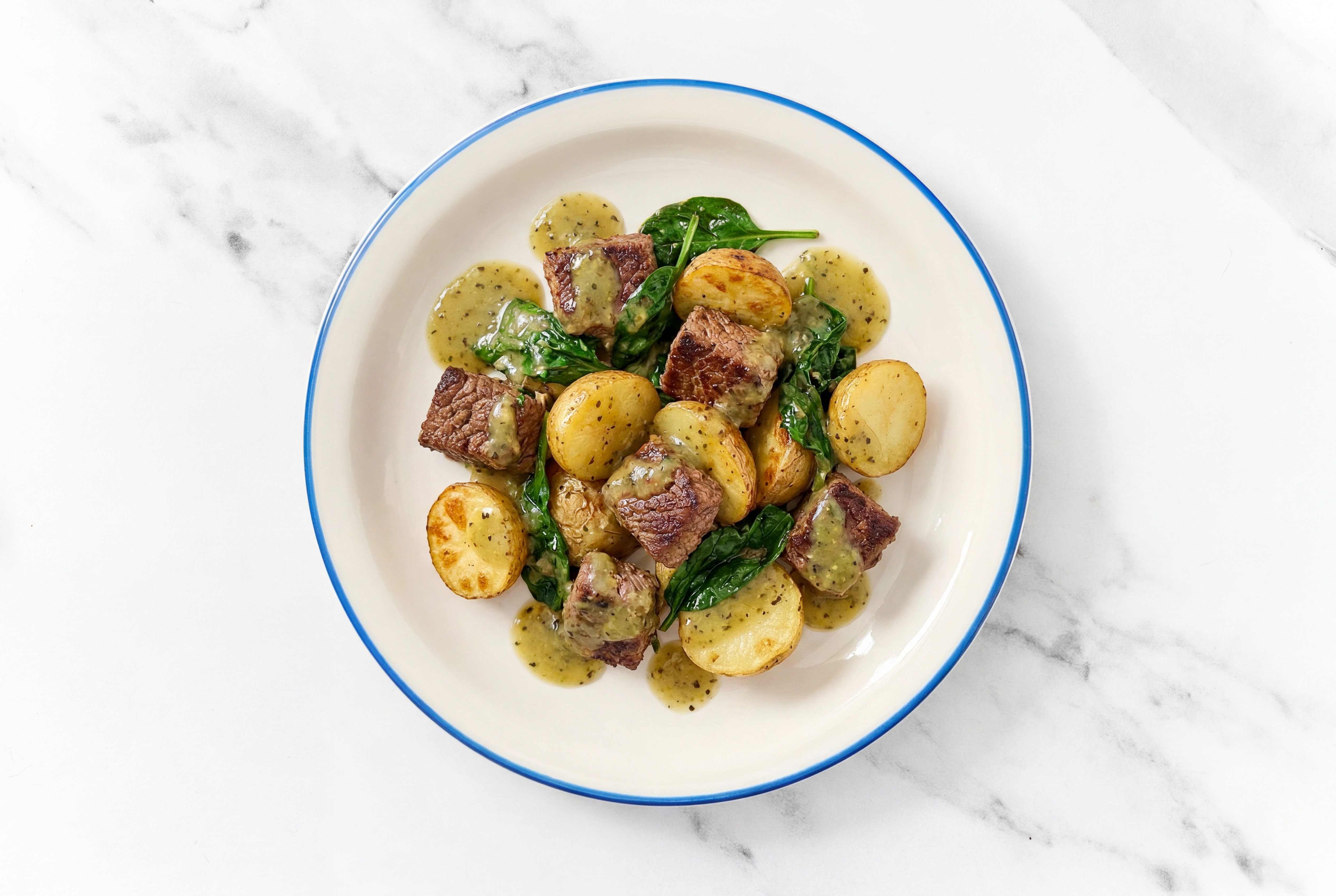 Green Chile Seared Bison with Organic Potatoes & Spinach