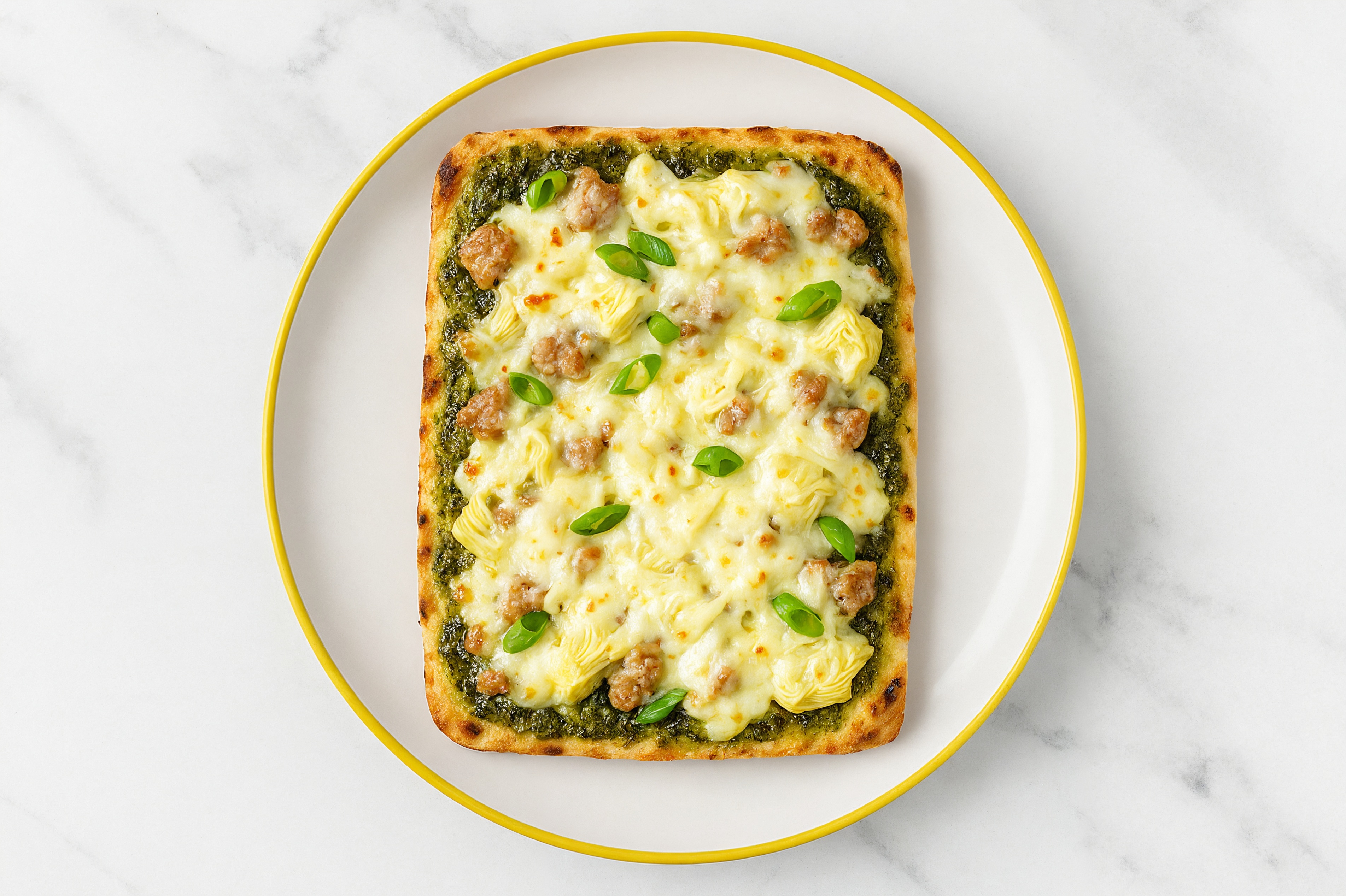 Pesto Pork Sausage + Artichoke Pizza with Scallions