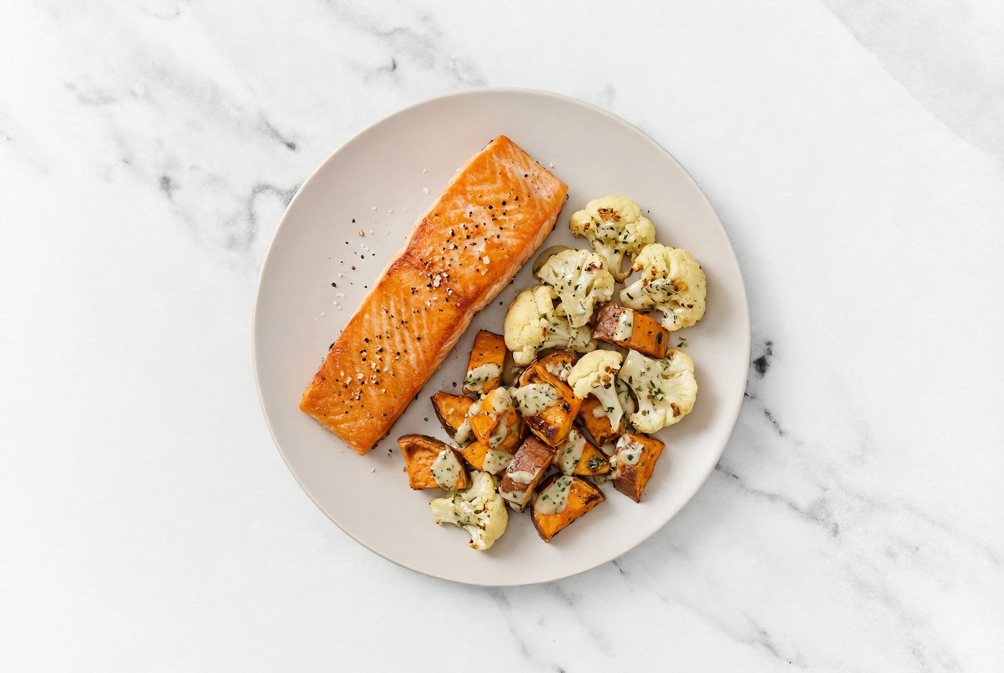 Sheet Pan Tahini-Salmon with Sweet Potatoes & Cauliflower