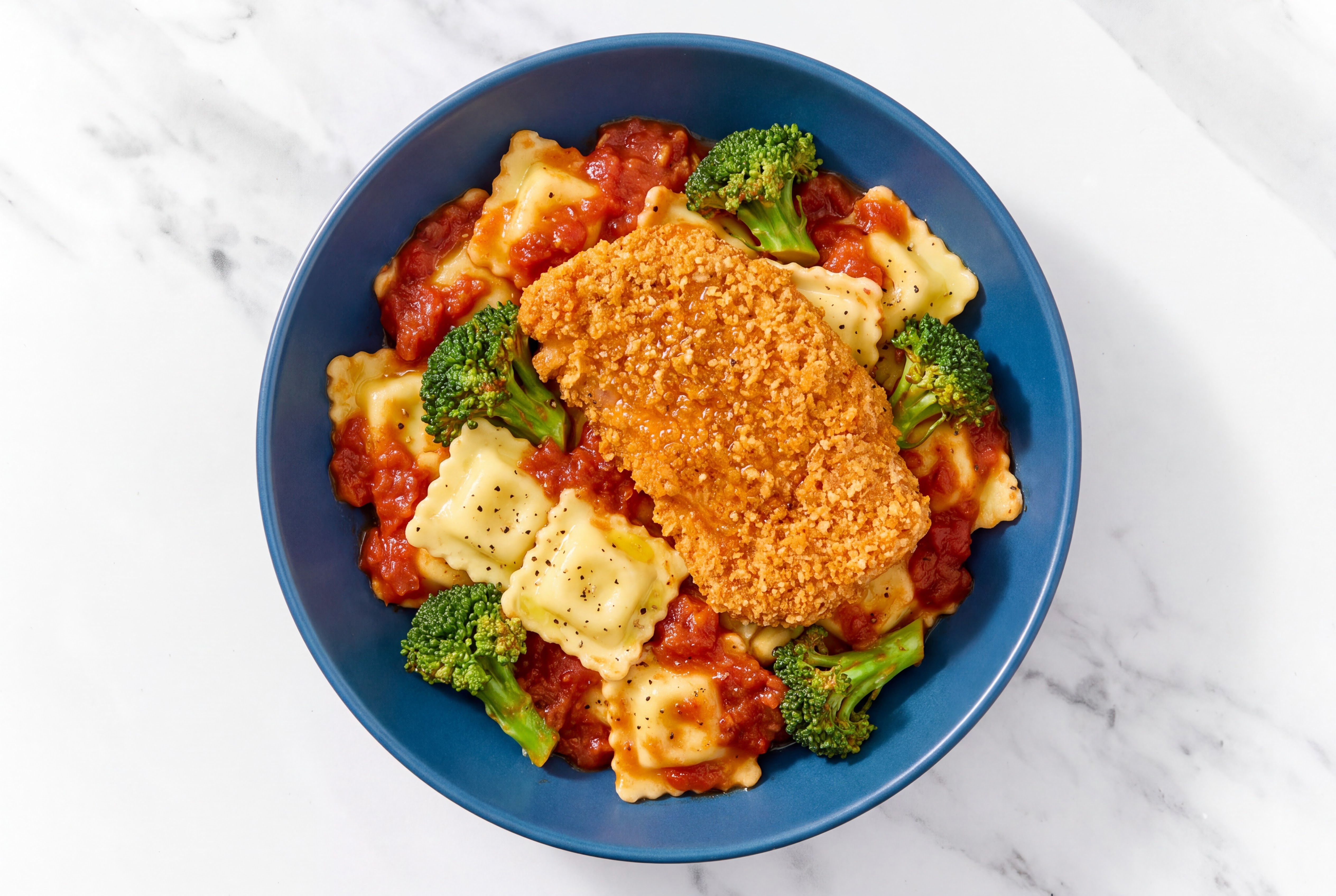 Crispy Hot Honey Chicken over Marinara Ravioli with Broccoli