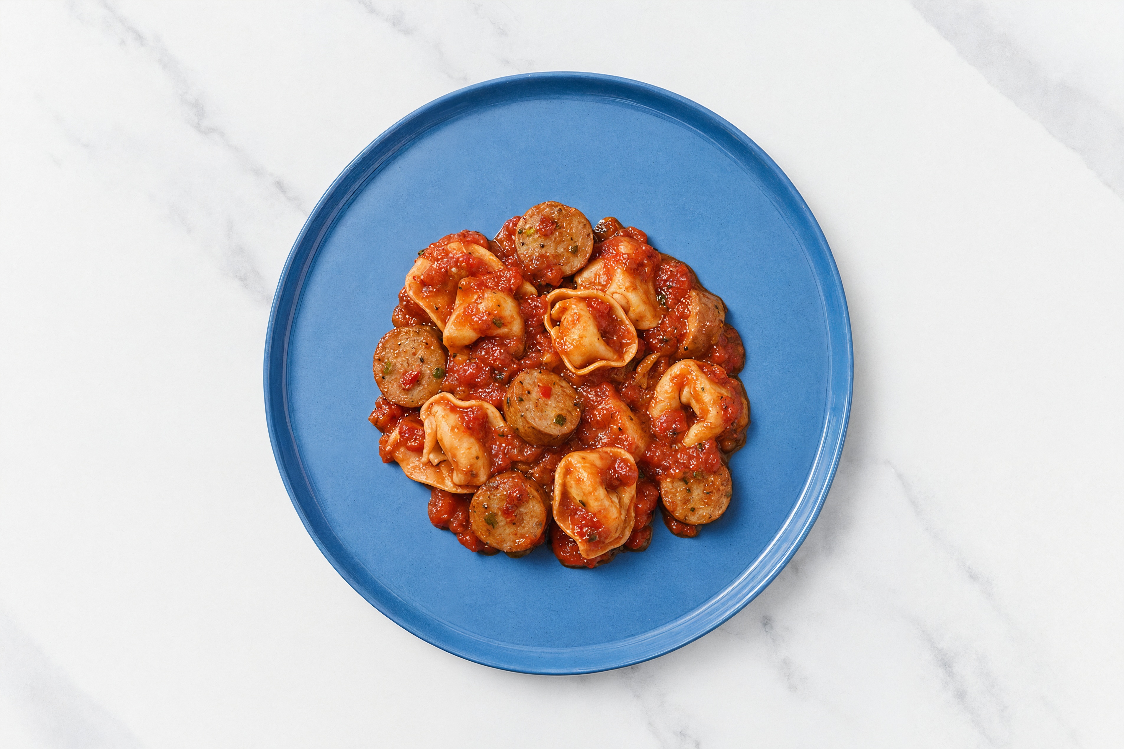 Four Cheese Tortelloni with Chicken Sausage & Tomato Marinara