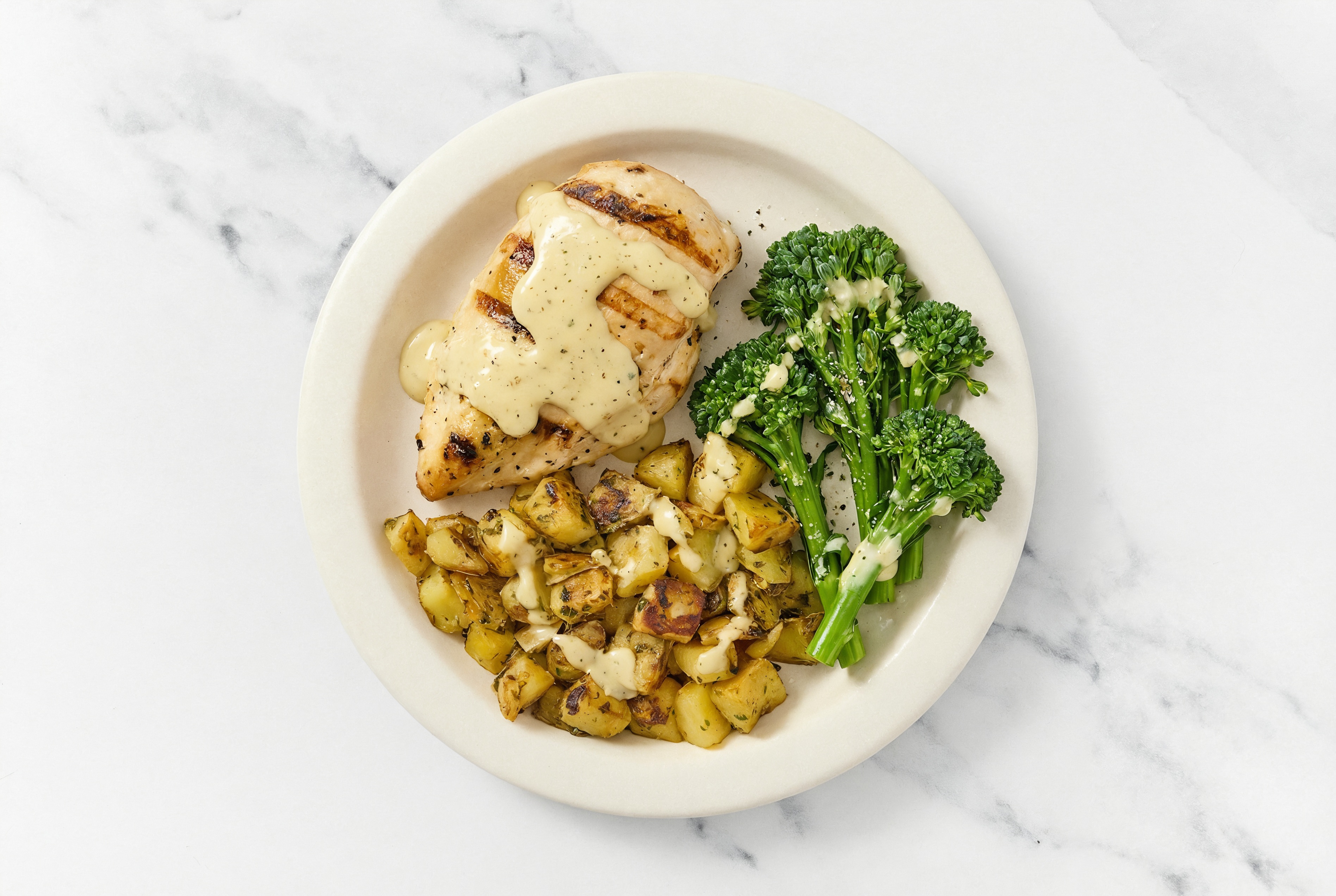 Caesar Seasoned Grilled Chicken Breast, Baby Broccoli + Herbed Sous Vide Herby Potatoes