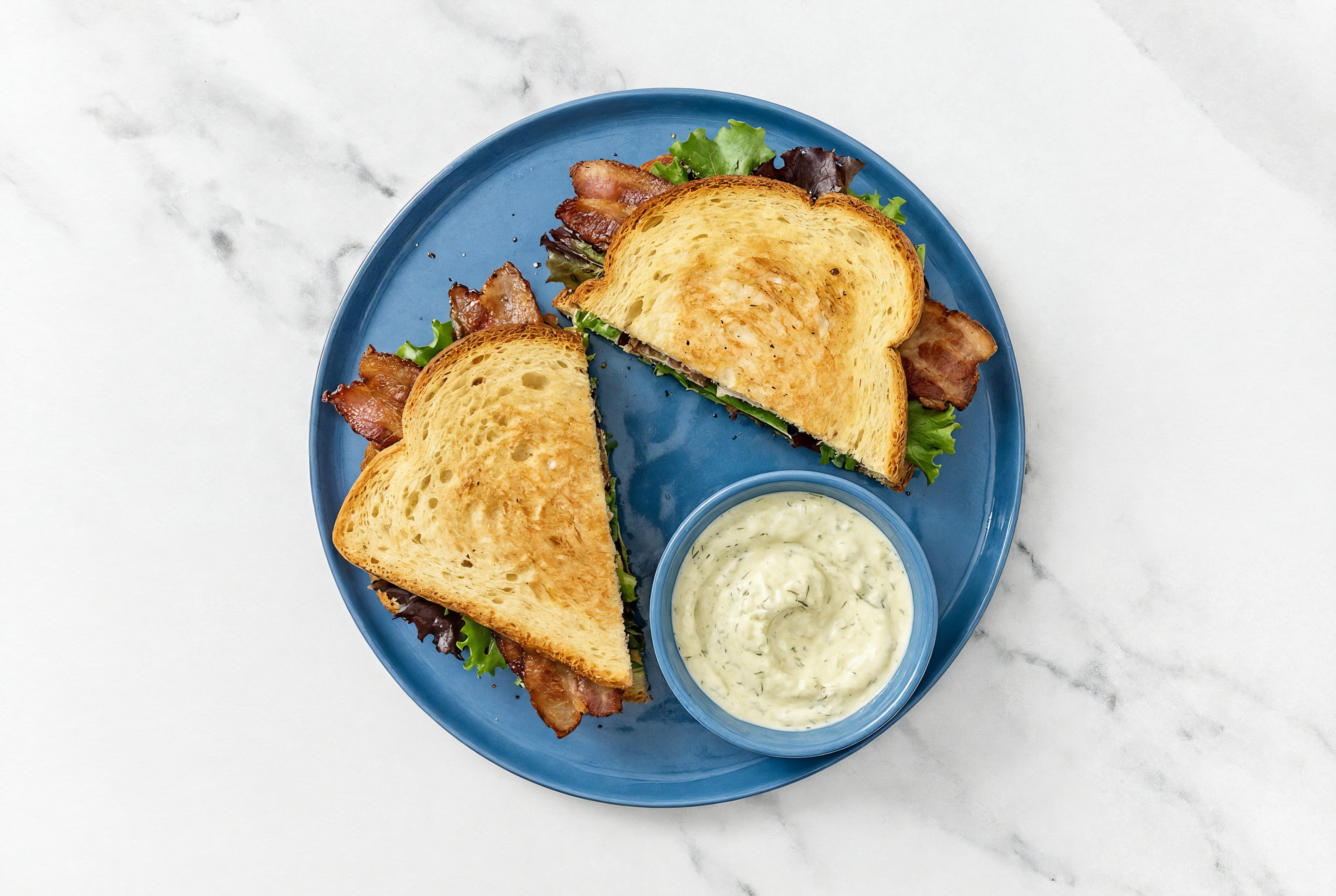 Dill Pickle Smoked Bacon Sandwich with Spring Mix on Honey White Bread