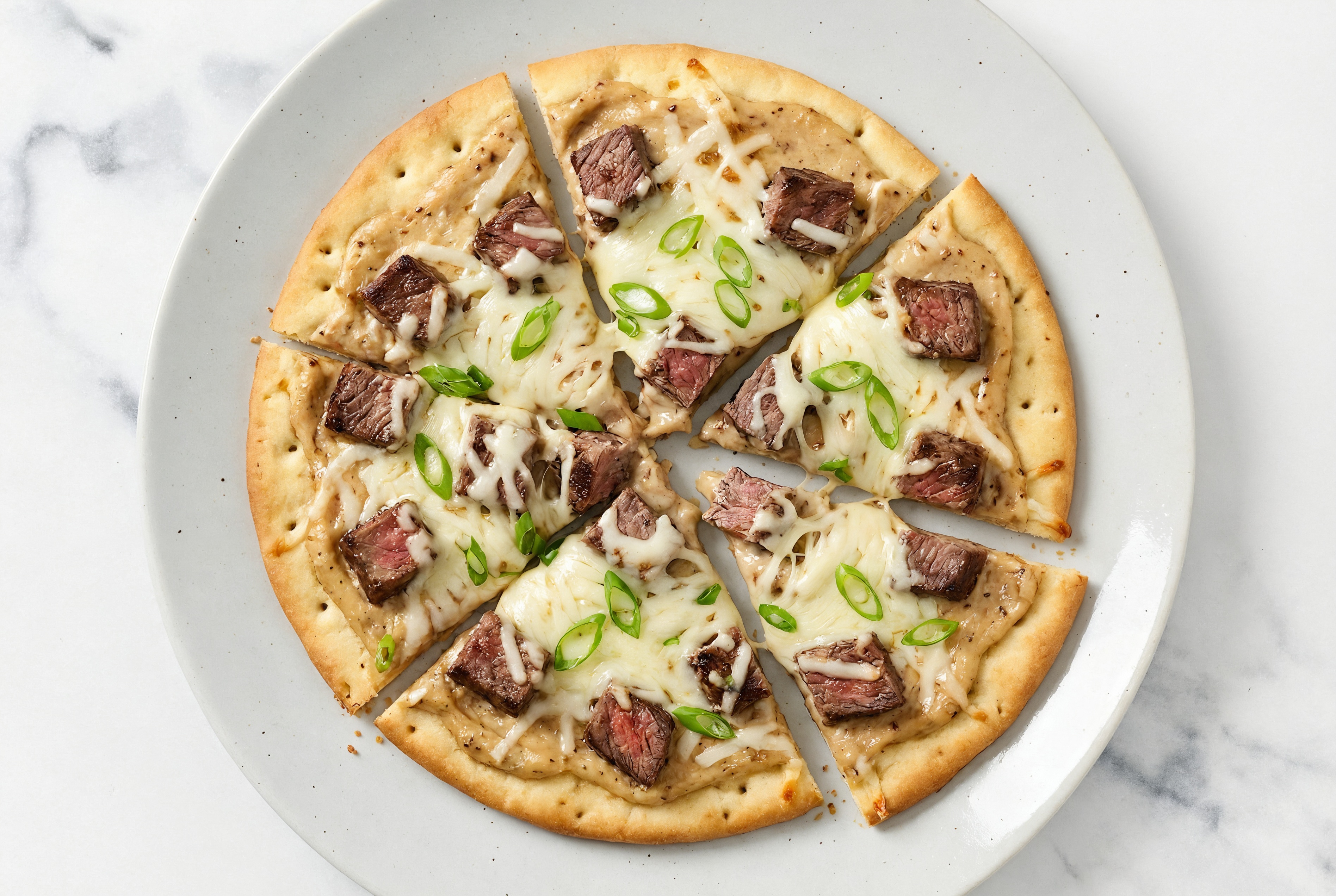 Sweet Onion Wagyu Strip Pizza with "Mozzarella" + Fresh Scallions