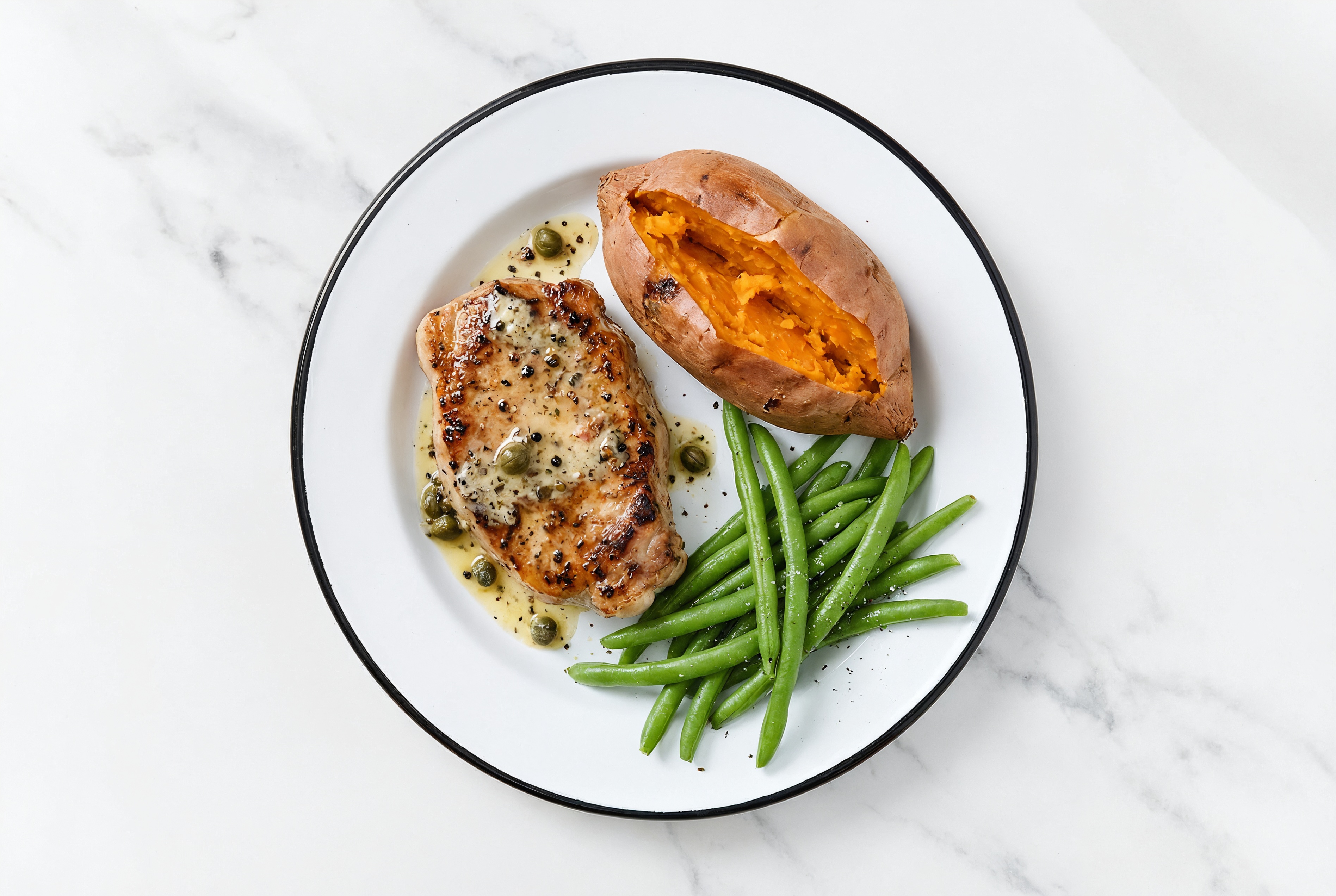 Caper-Slow Churned Lemon & Peppercorn Pasture Butter Pork Chops with Sweet Potato & Green Beans