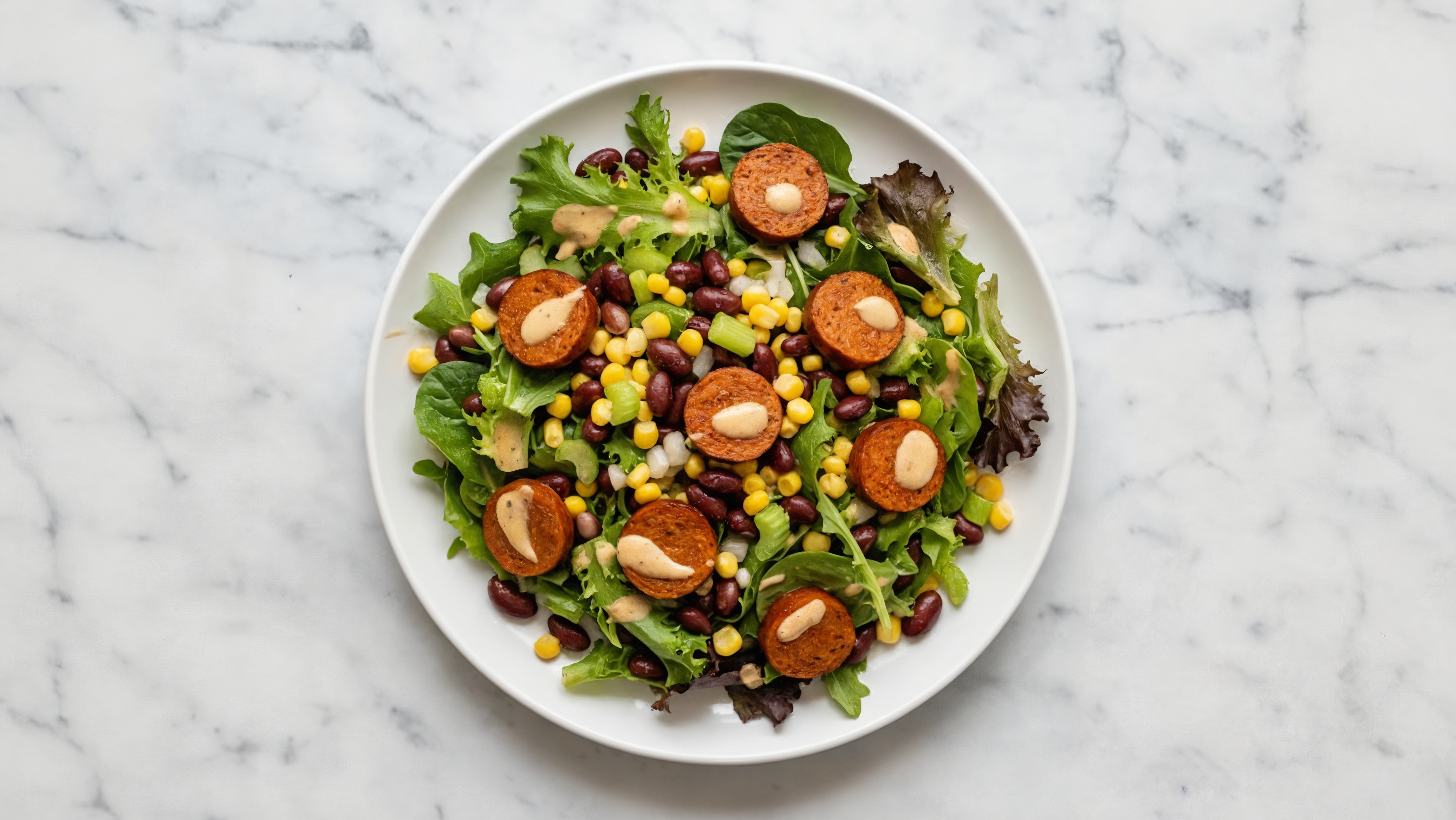 Buffalo Ranch Spring Mix Salad with Turkey Sausage & Black Beans