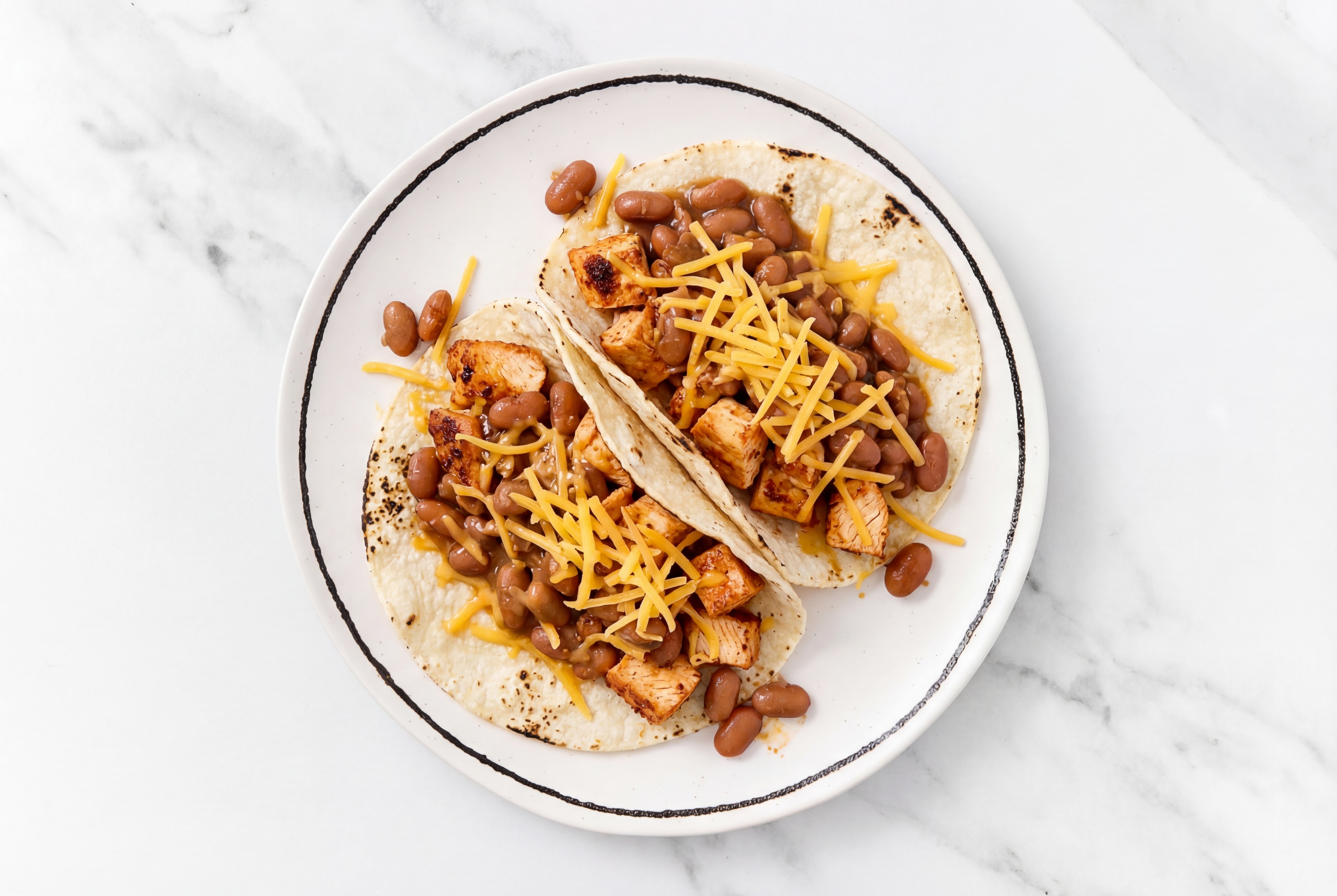 Hearty Chipotle Chicken Tacos with Cheddar Cheese & Pinto Beans