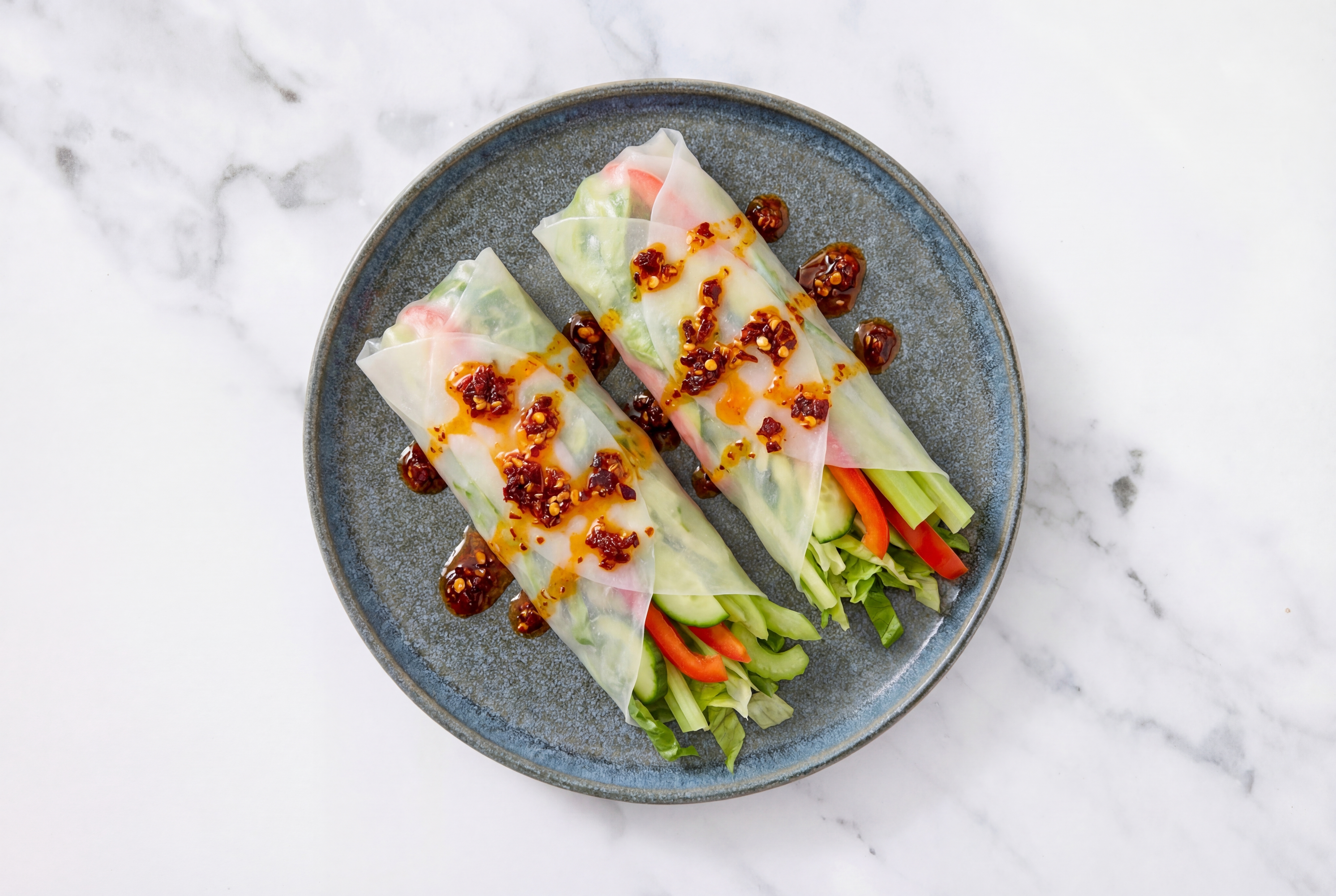 Hearty Chili Crisp Veggie Summer Rolls with Red Bell Pepper