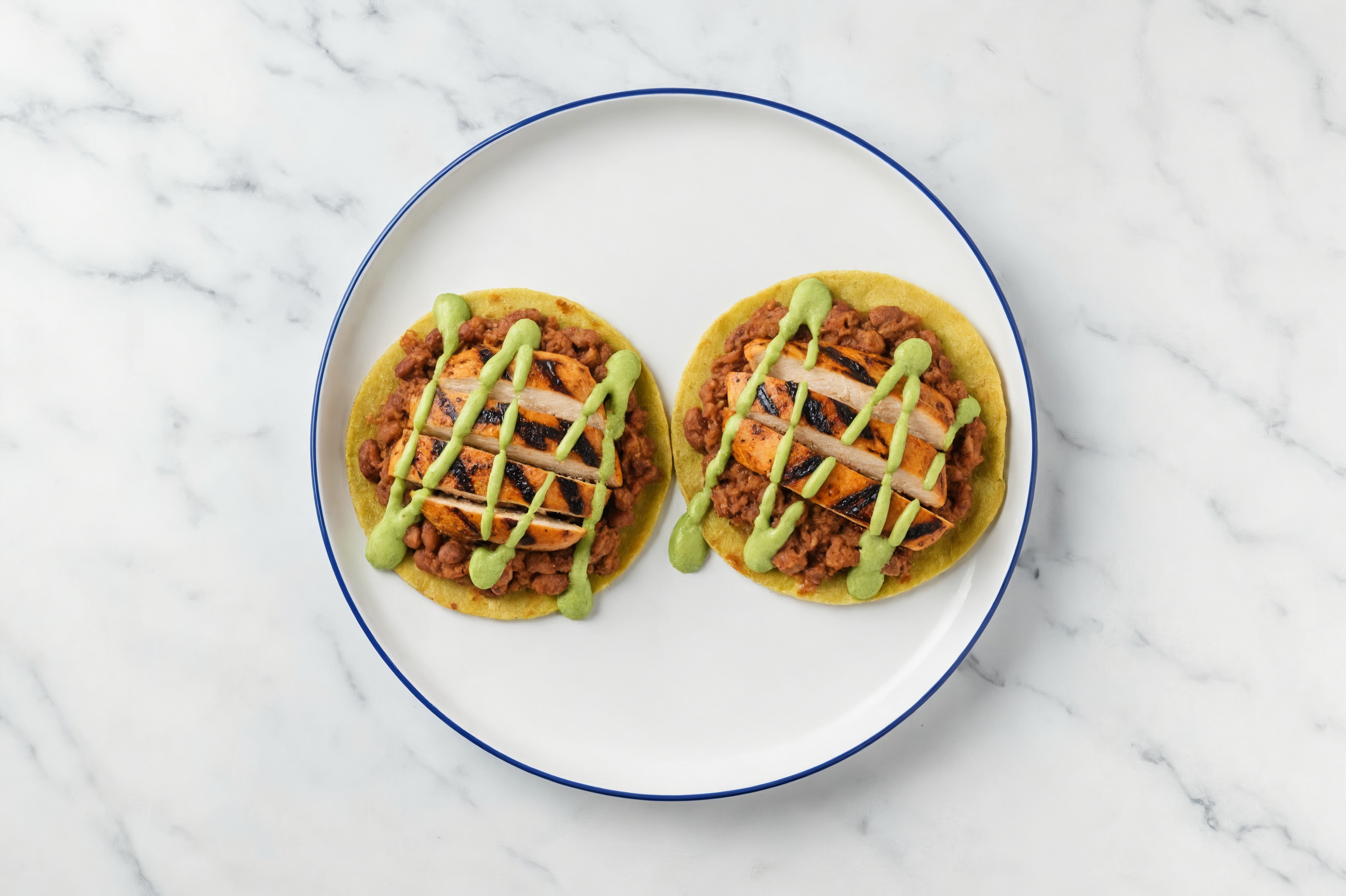 Extra Guac Blackened Chicken Tostada with Spinach Tortilla
