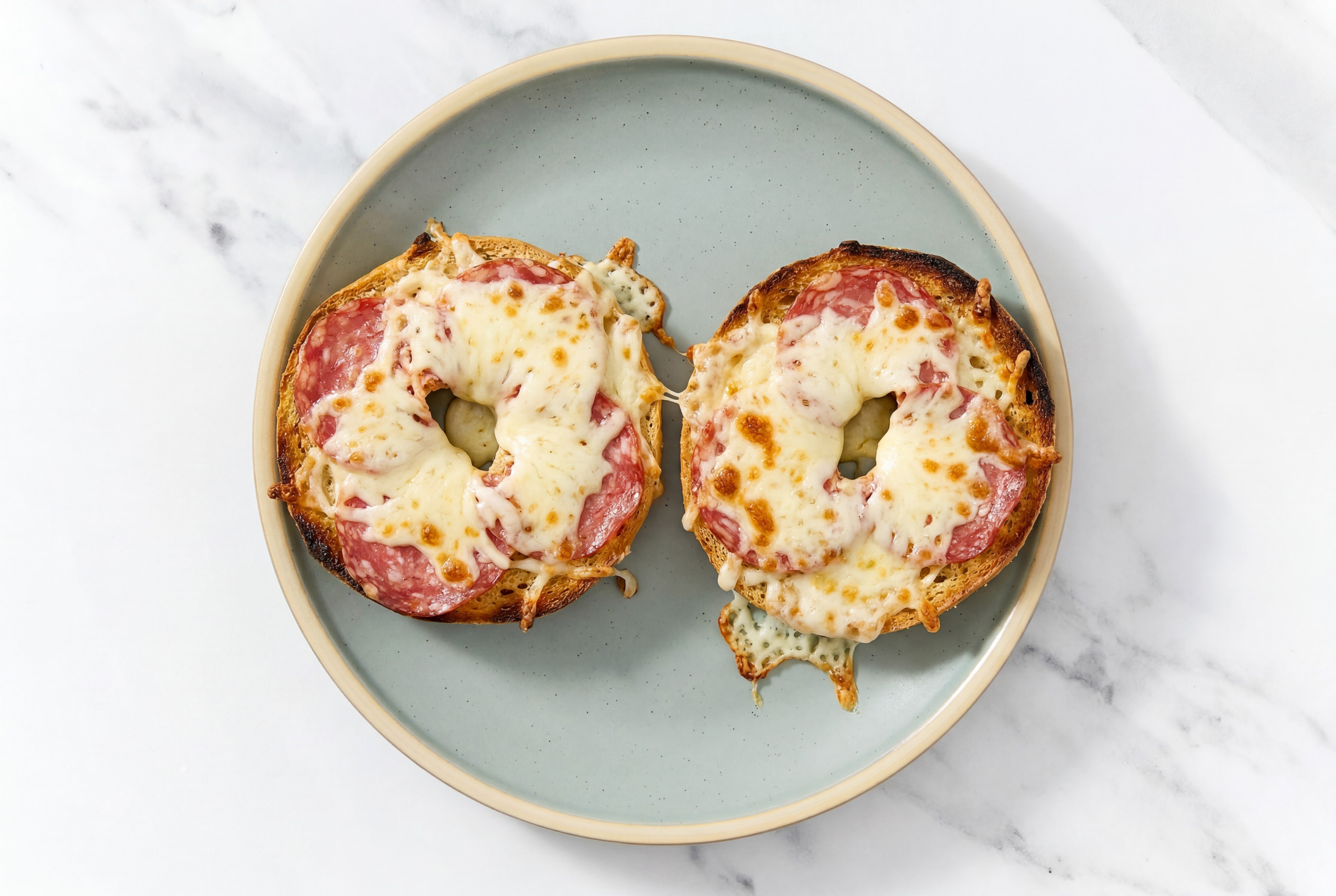 Simplest Salami Pizza Bagels with Shredded Mozzarella Cheese