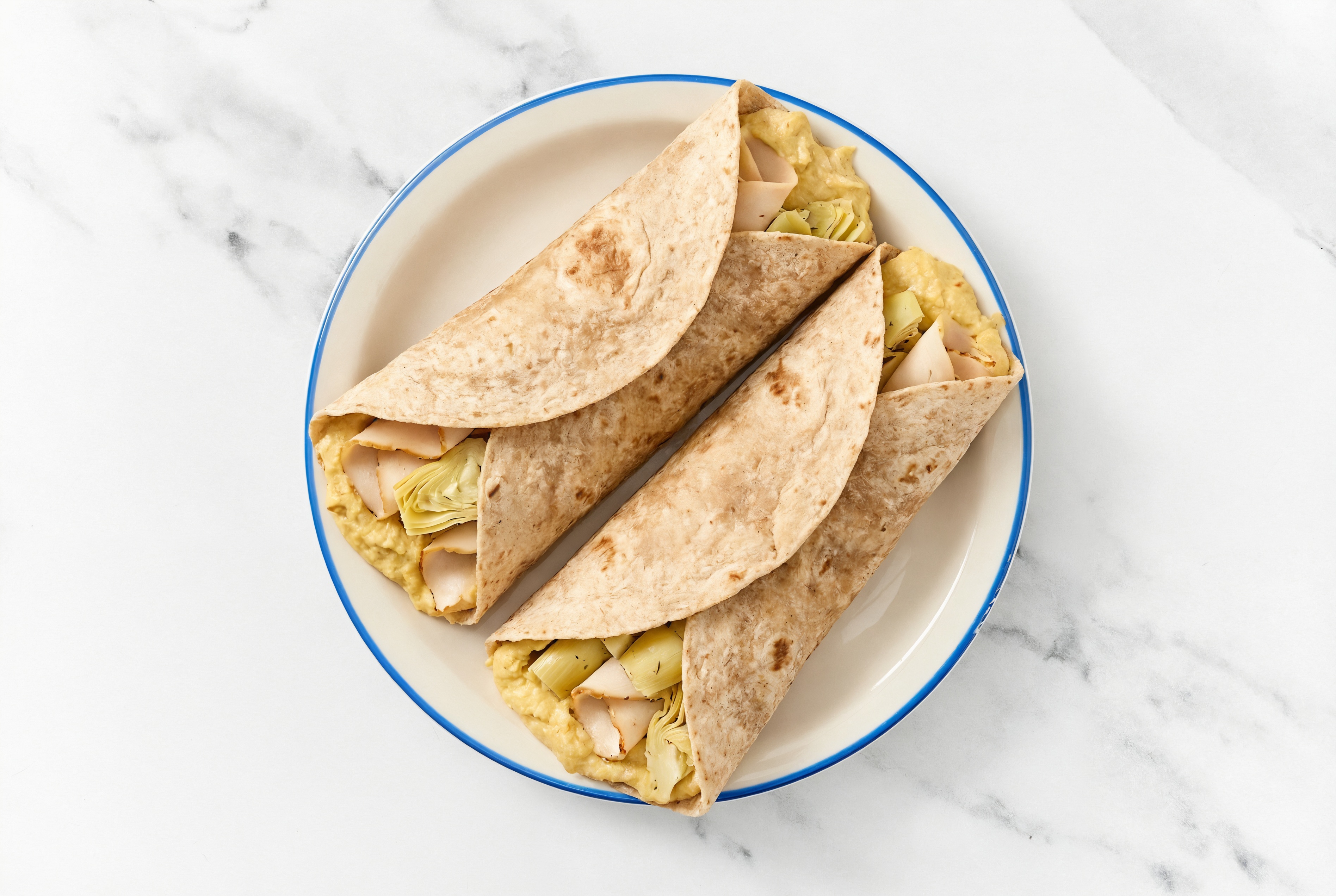Mediterranean-Inspired Chicken + French Onion Hummus Wrap