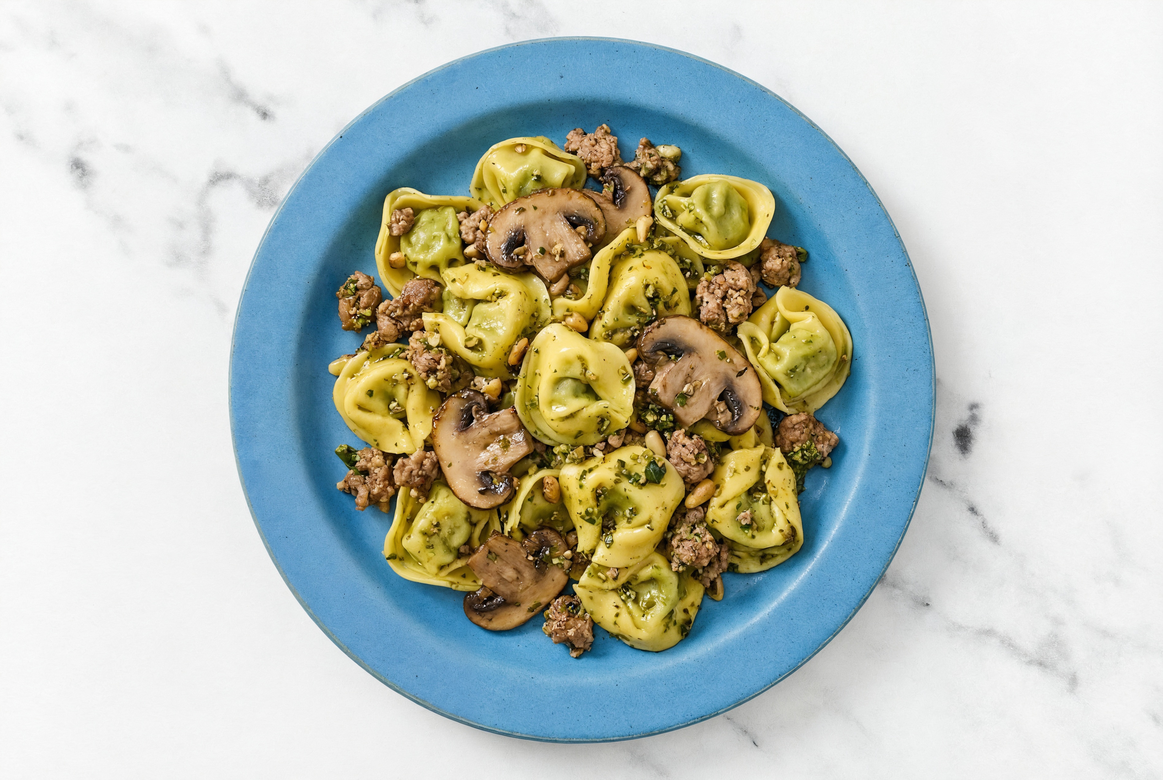 Tortelloni Pesto with Ground Lamb & Mushrooms with Spinach Tortellini with Almond Milk Ricotta Alternative