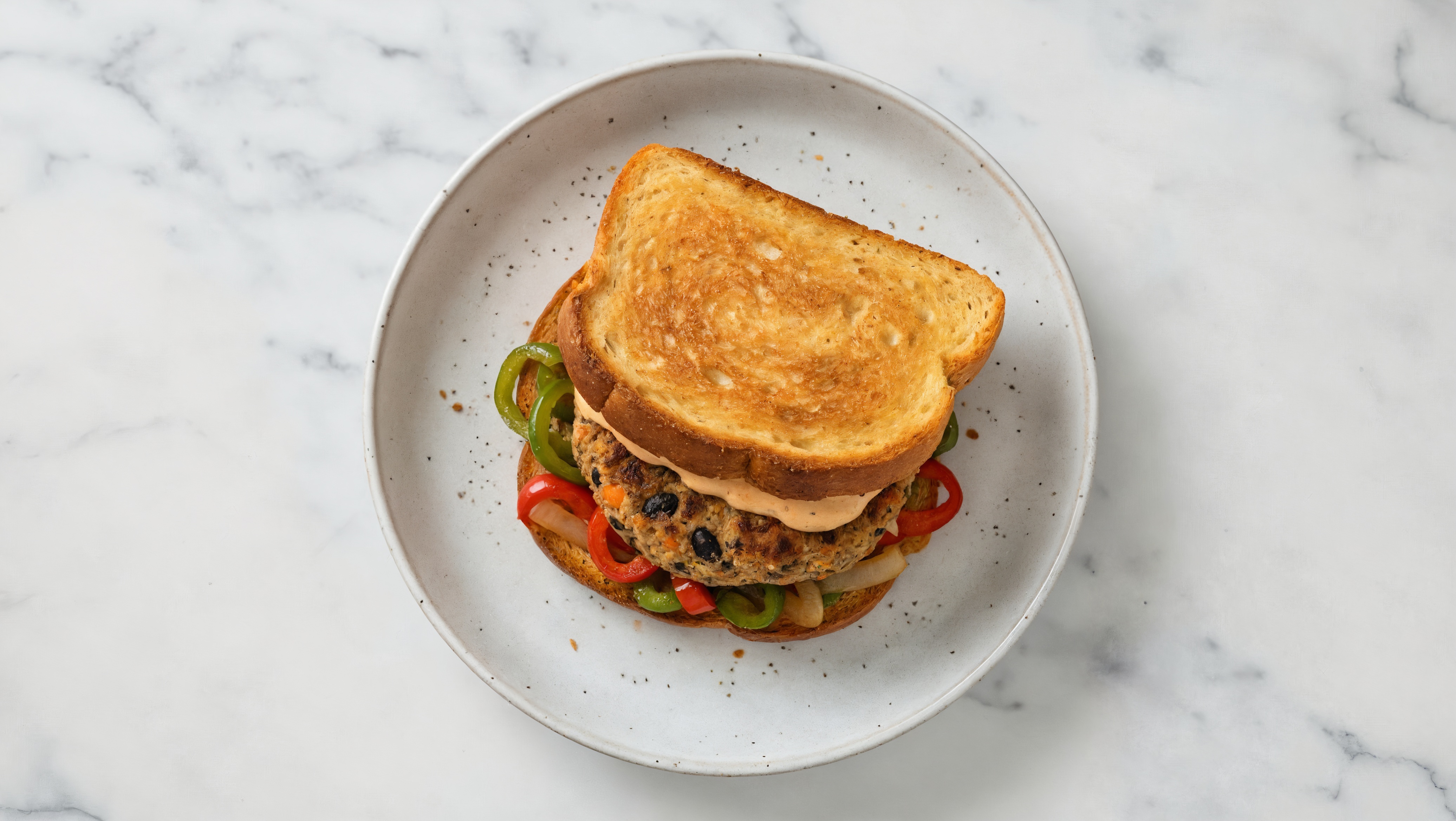 Onion + Pepper Black Bean Burger on GF Bread with Buffalo Ranch