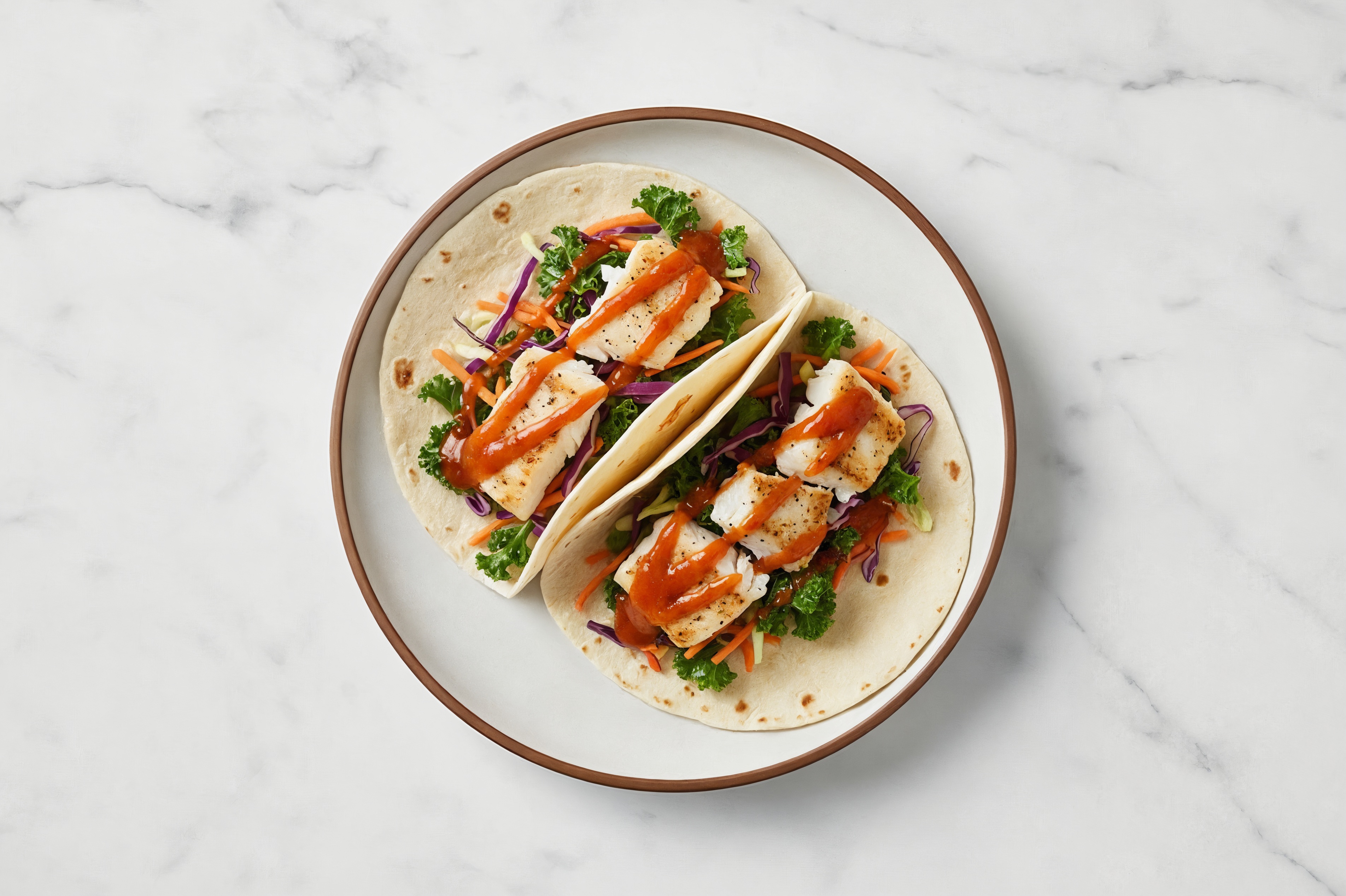 Sweet Chili Lime Halibut Tacos with Sautéed Kale Mix