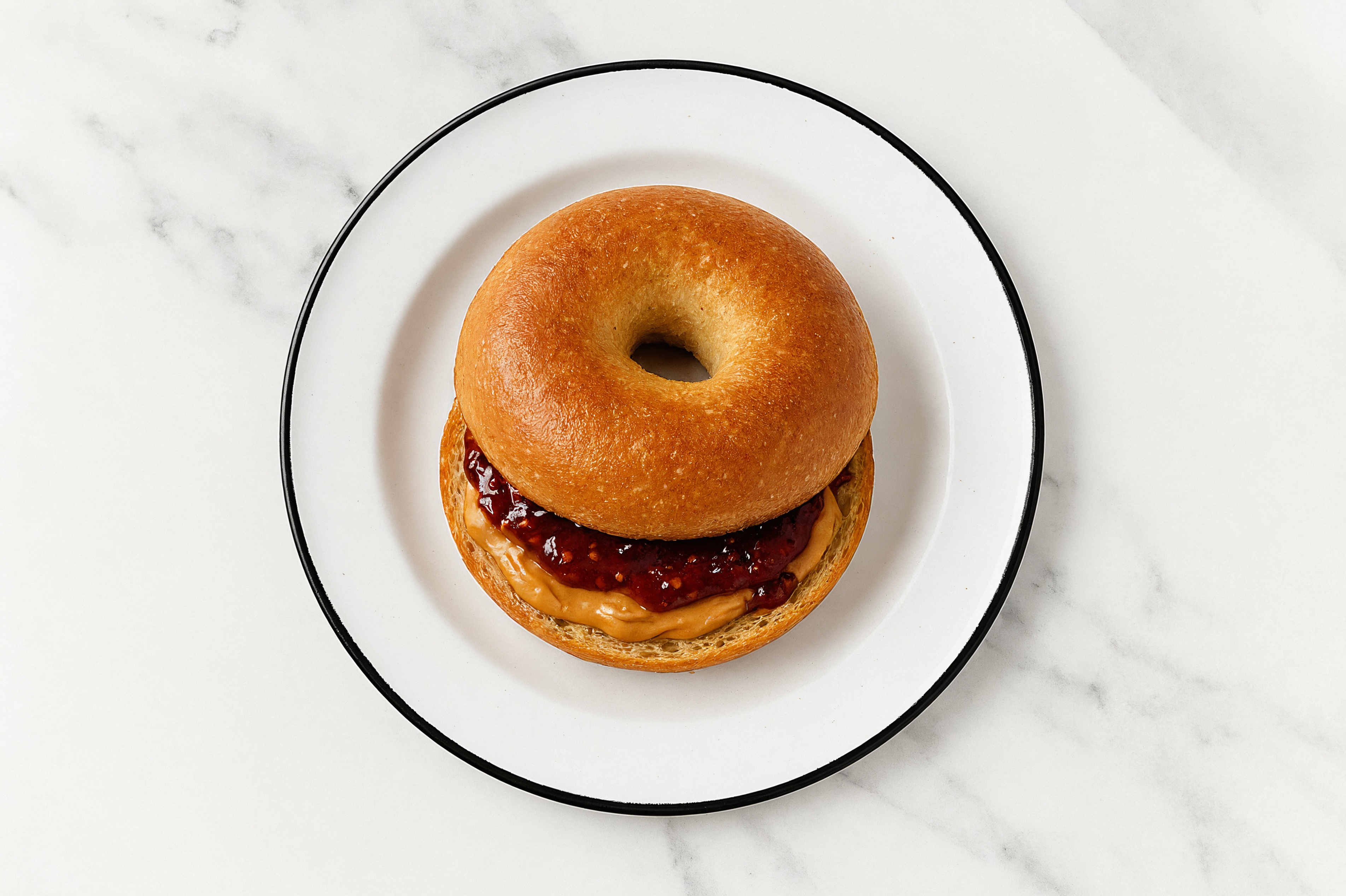 Peanut Butter + Strawberry Jam Bagel Sandwich