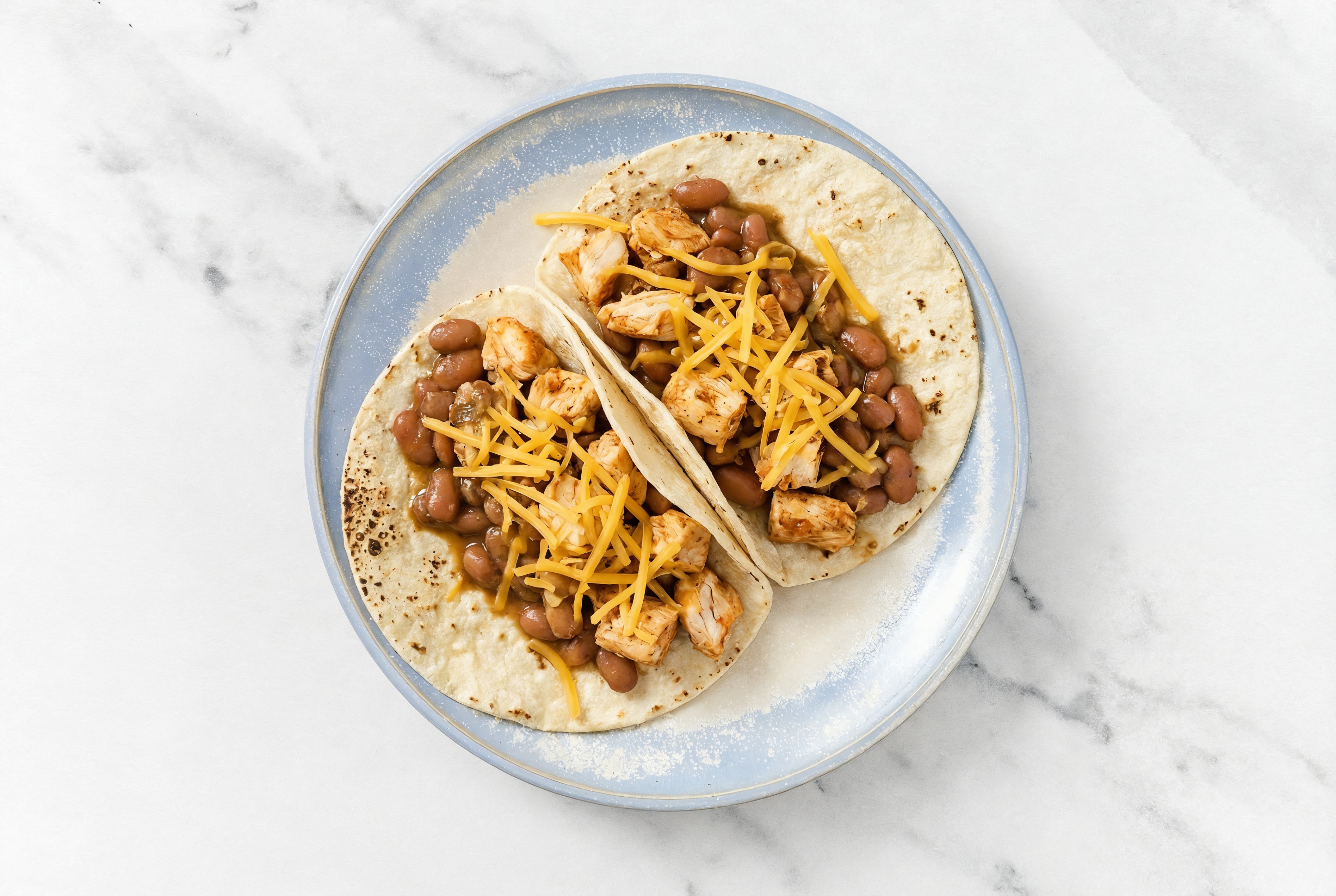 Cheesy Chicken + Pinto Bean Tacos with Sharp Cheddar Bar