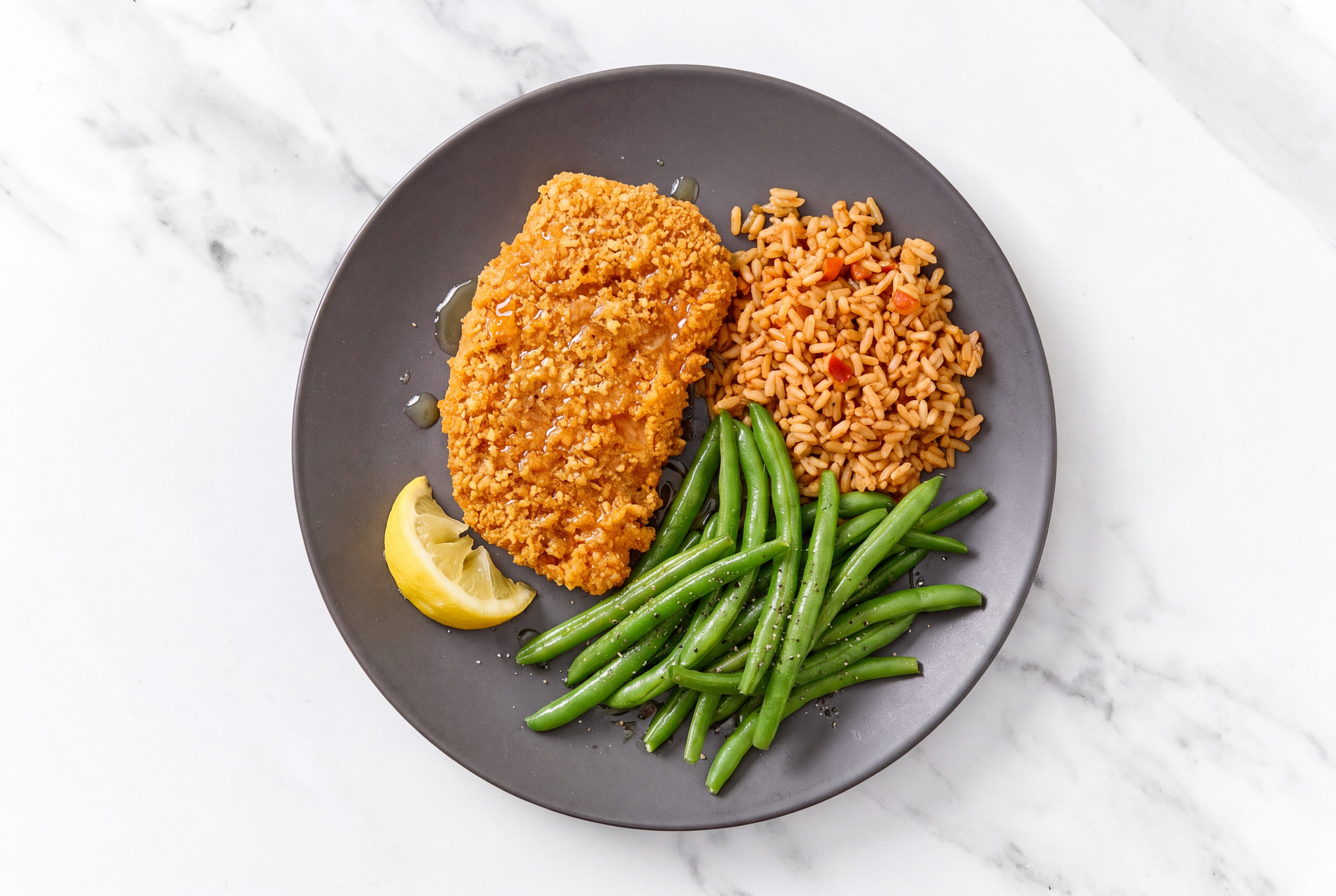 Lemon Hot Honey Breaded Chicken Cutlet with Green Beans & Mexican Rice