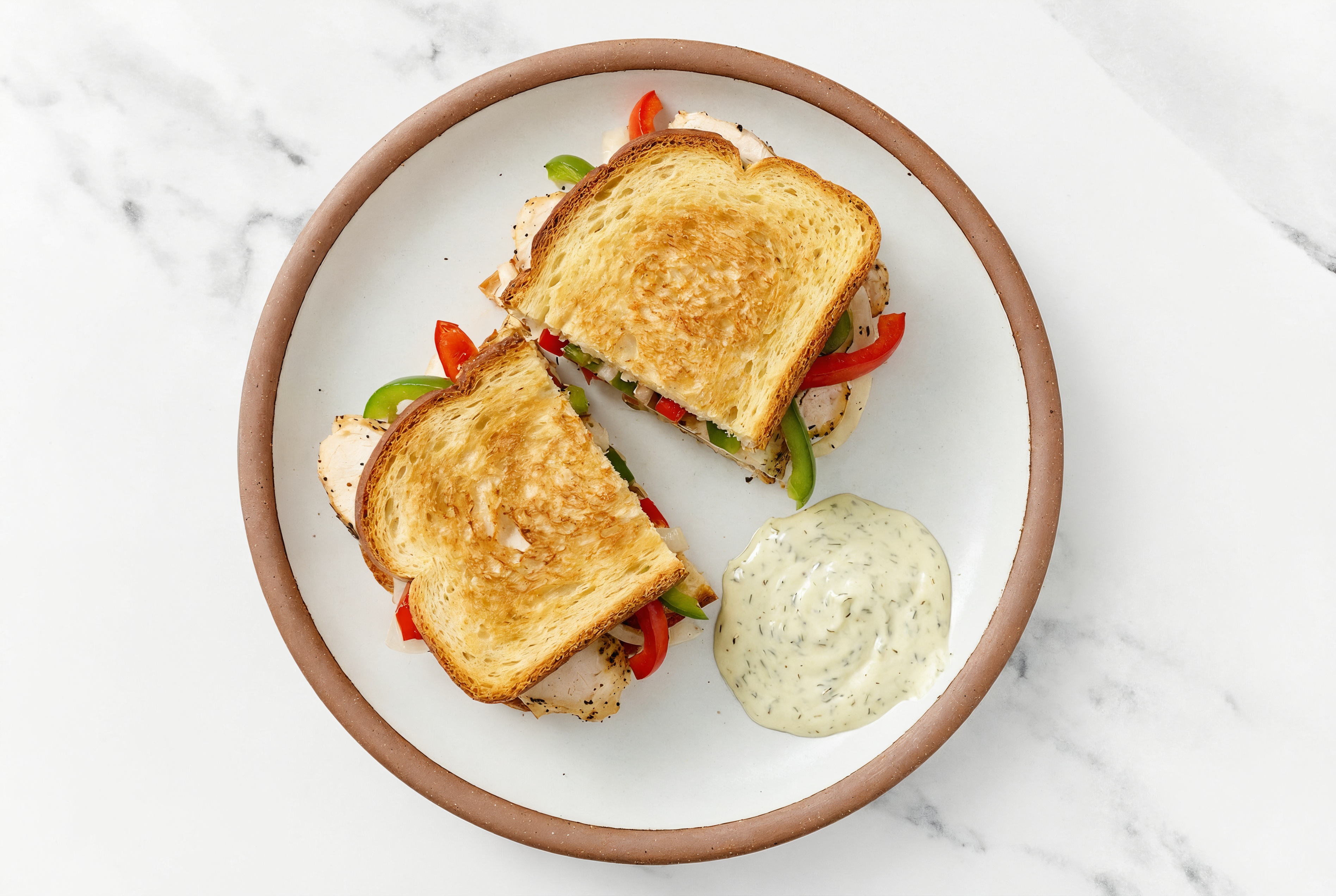 Dill Pickle Grilled Chicken Sandwich with Peppers + Onion on Honey White Bread