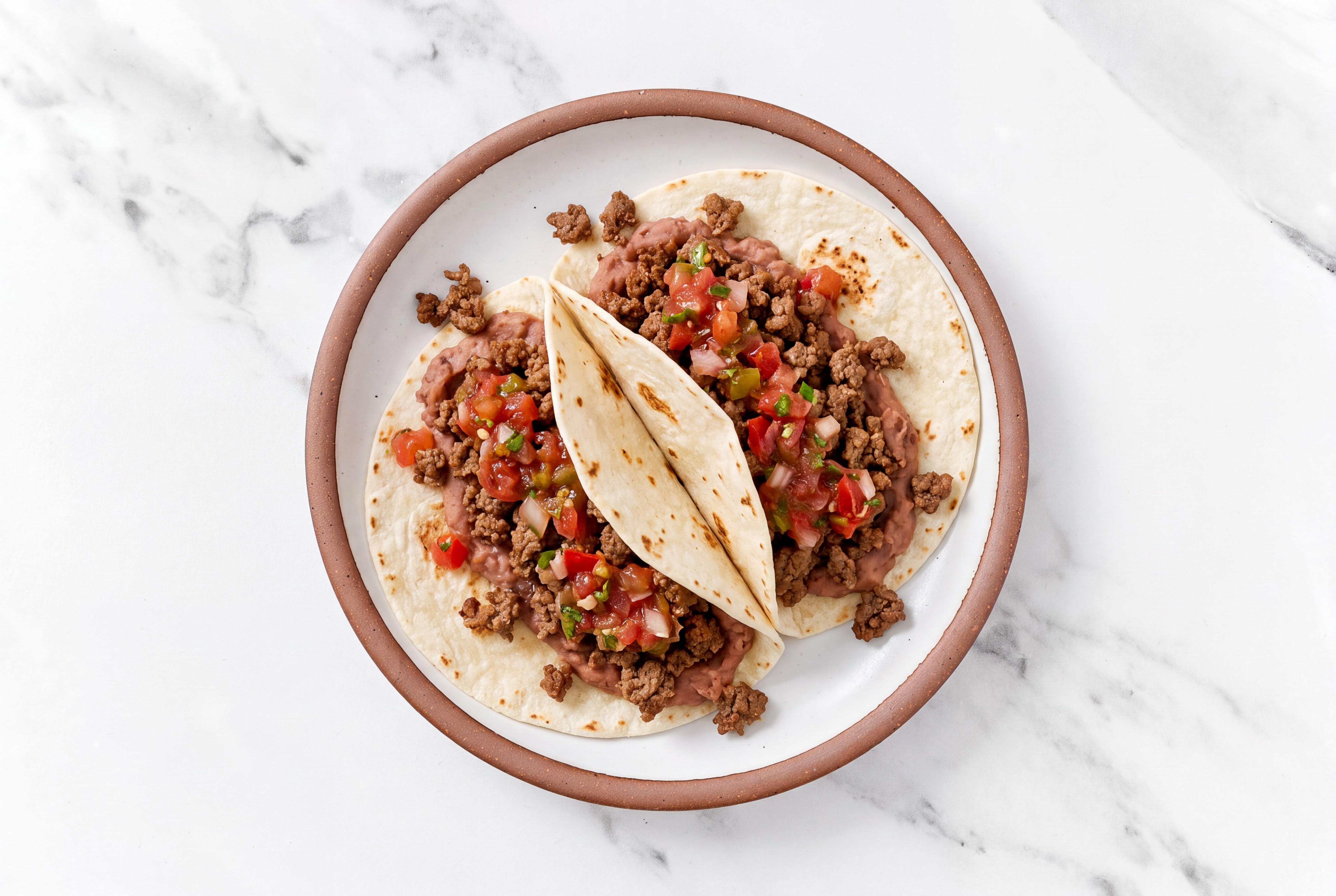 Ground 93/7 Lean Beef Tacos with Pico De Gallo & Refried Red Beans