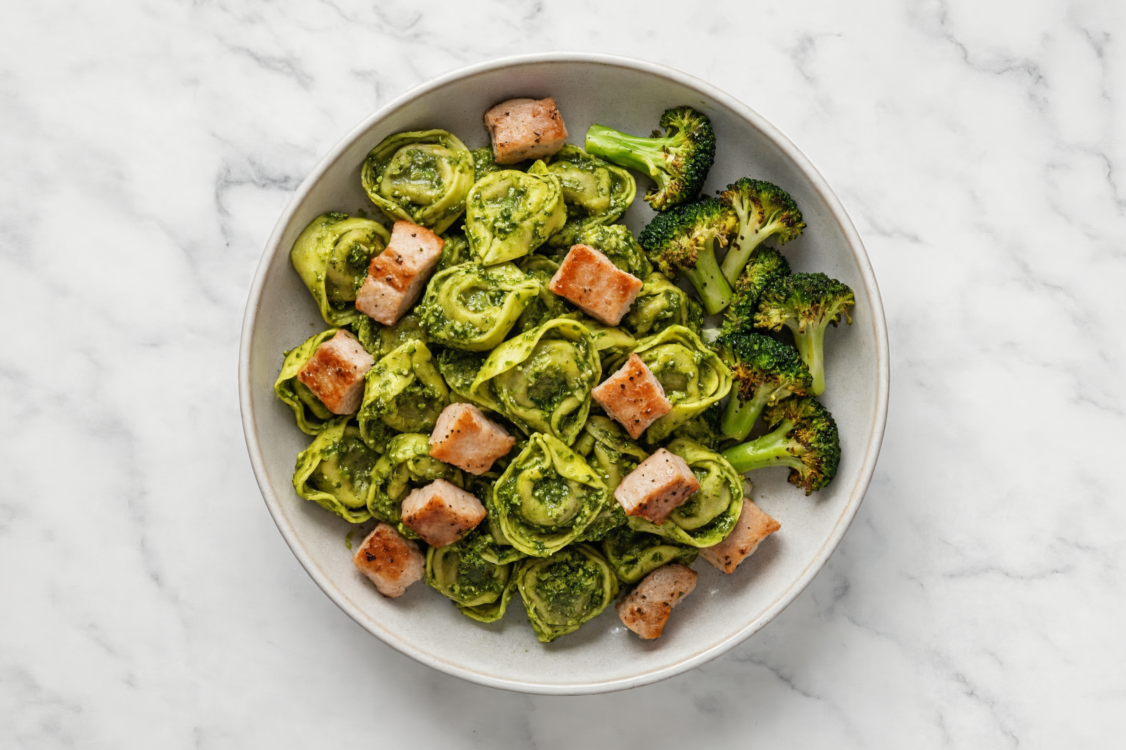 Spinach Pesto Tortelloni with Pork Chops & Broccoli
